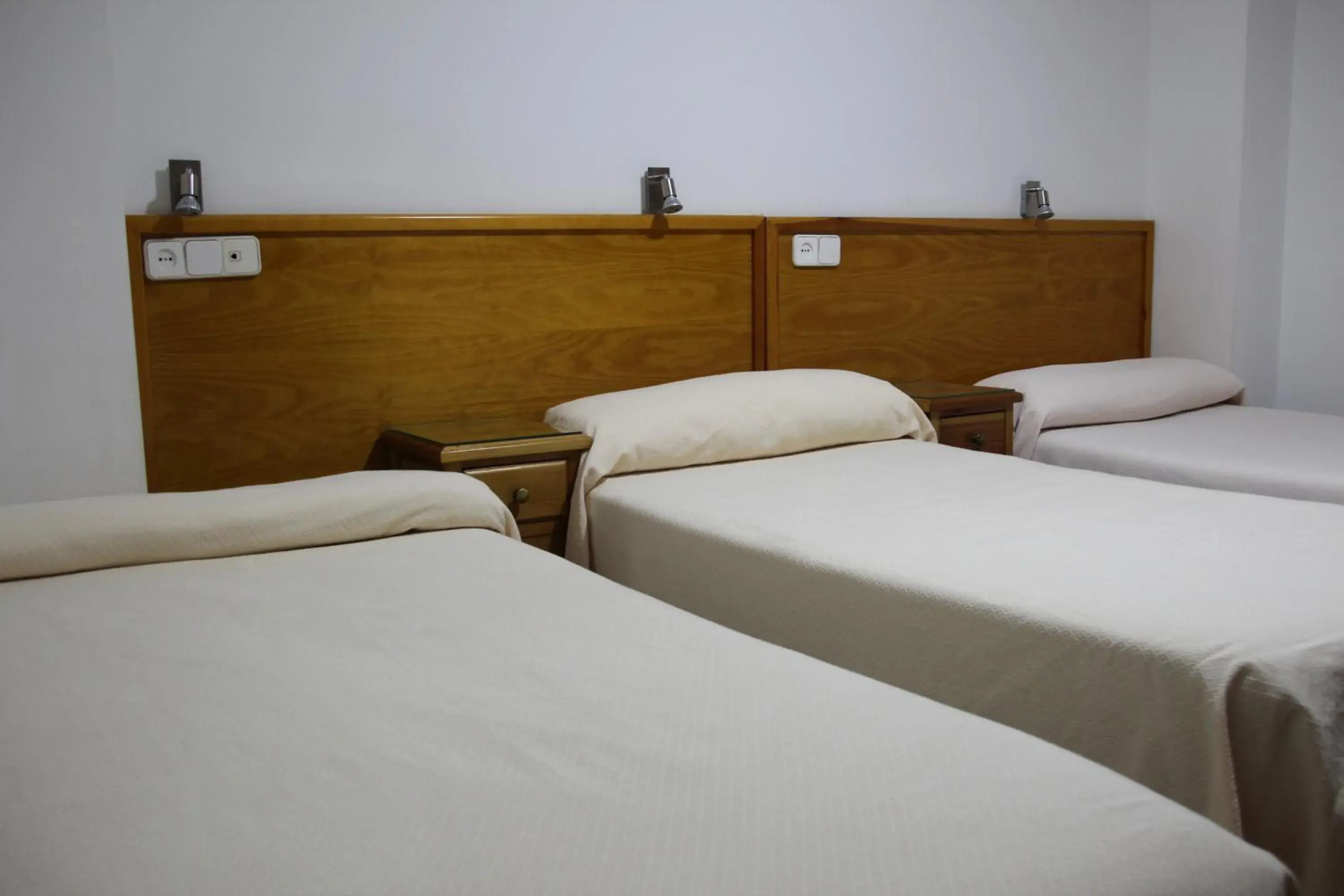 Triple Room in Hostal Maribel Triple Room in Hostal Maribel