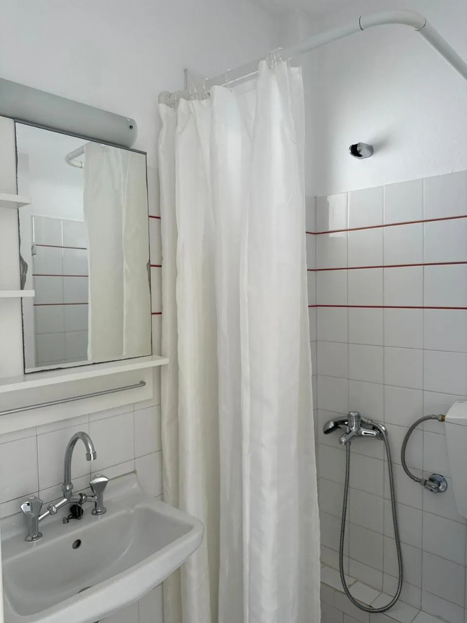 Bathroom in Εvi Evan Hotel