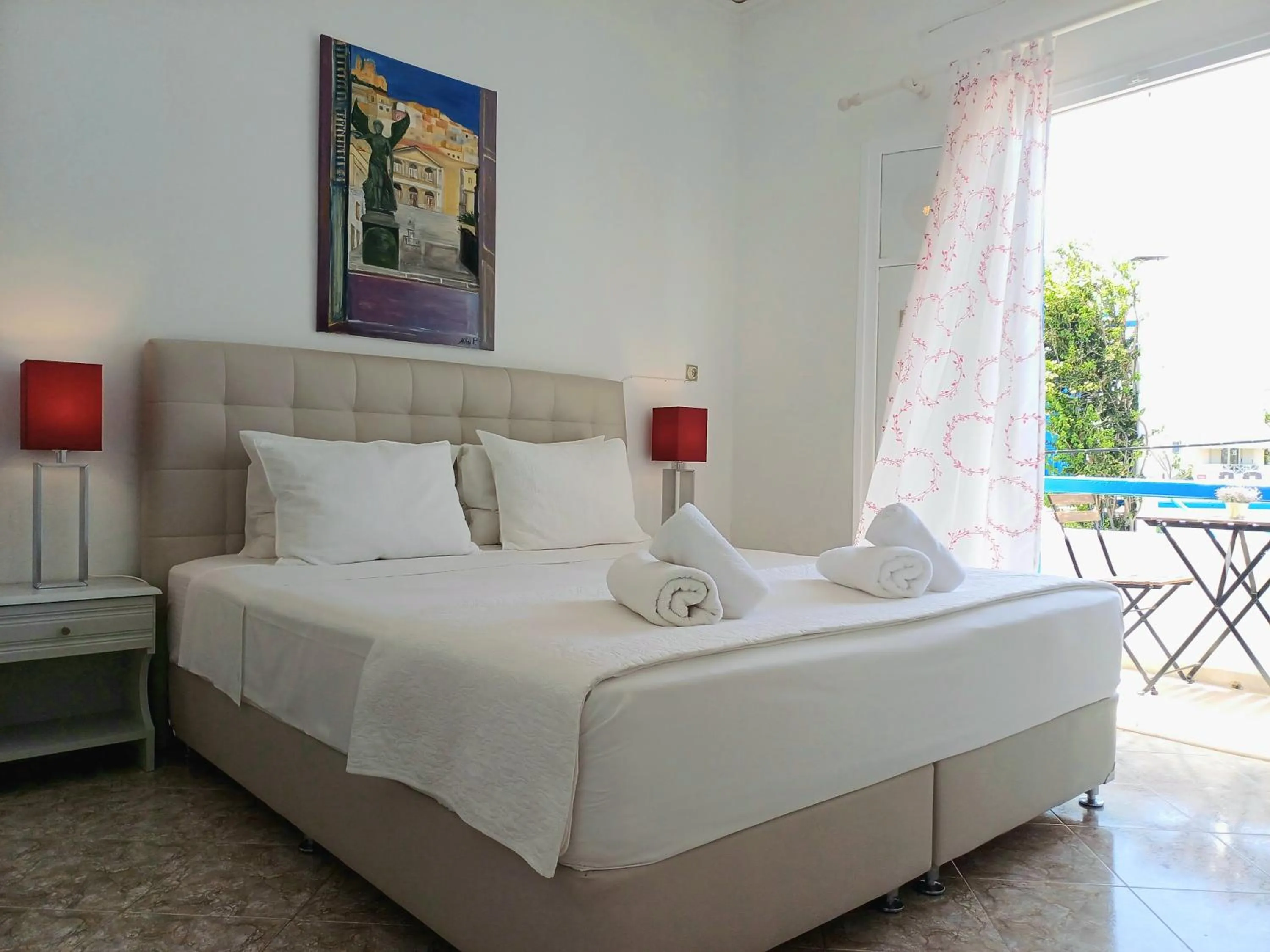 Bedroom in Εvi Evan Hotel