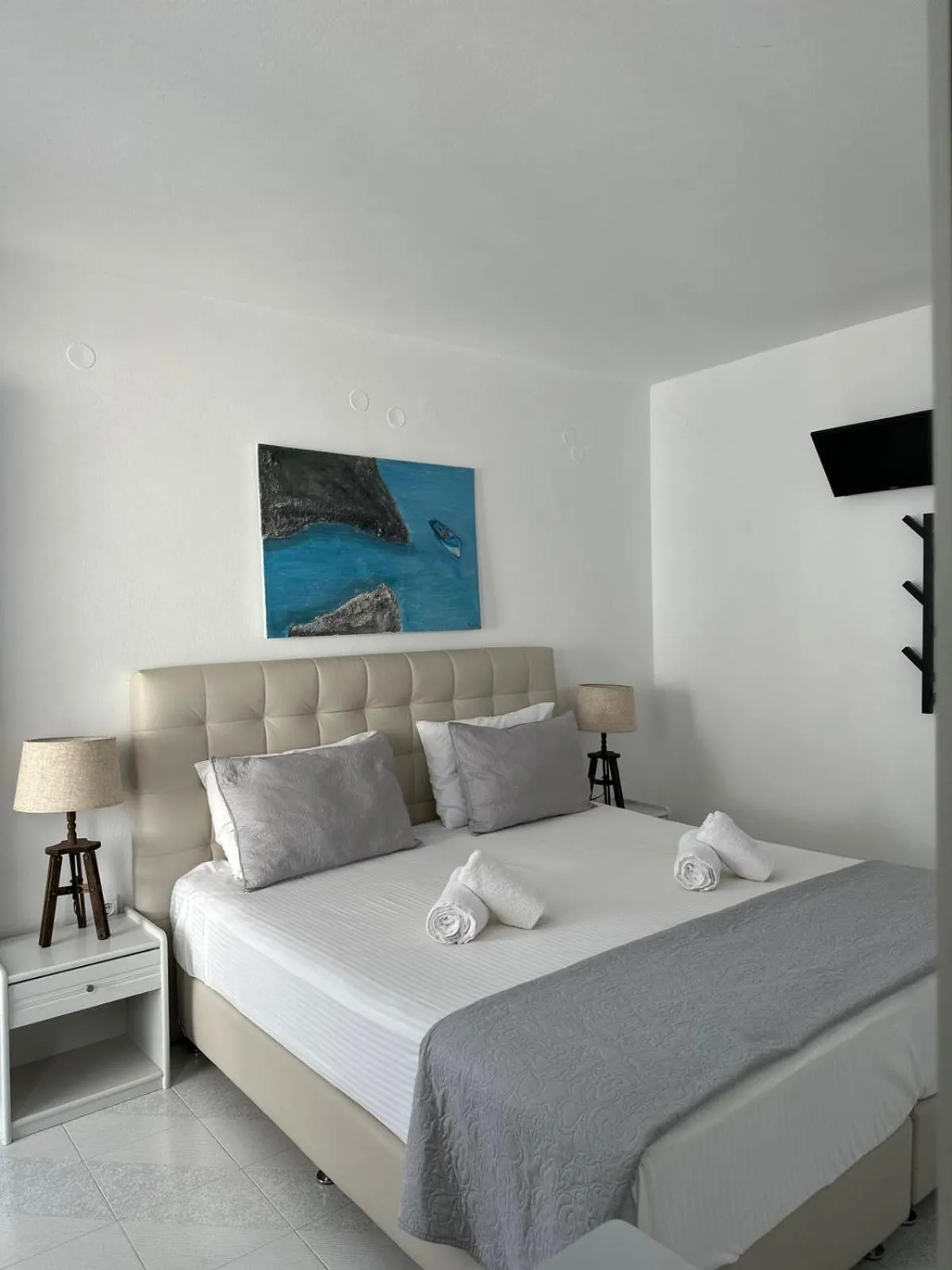 Bedroom in Εvi Evan Hotel