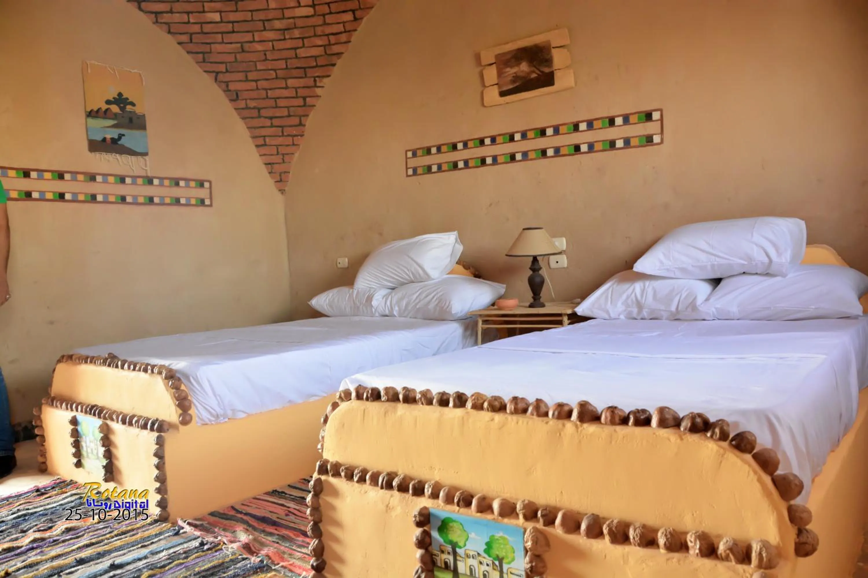 Photo of the whole room, Bed in Qasr El Bagawat Hotel