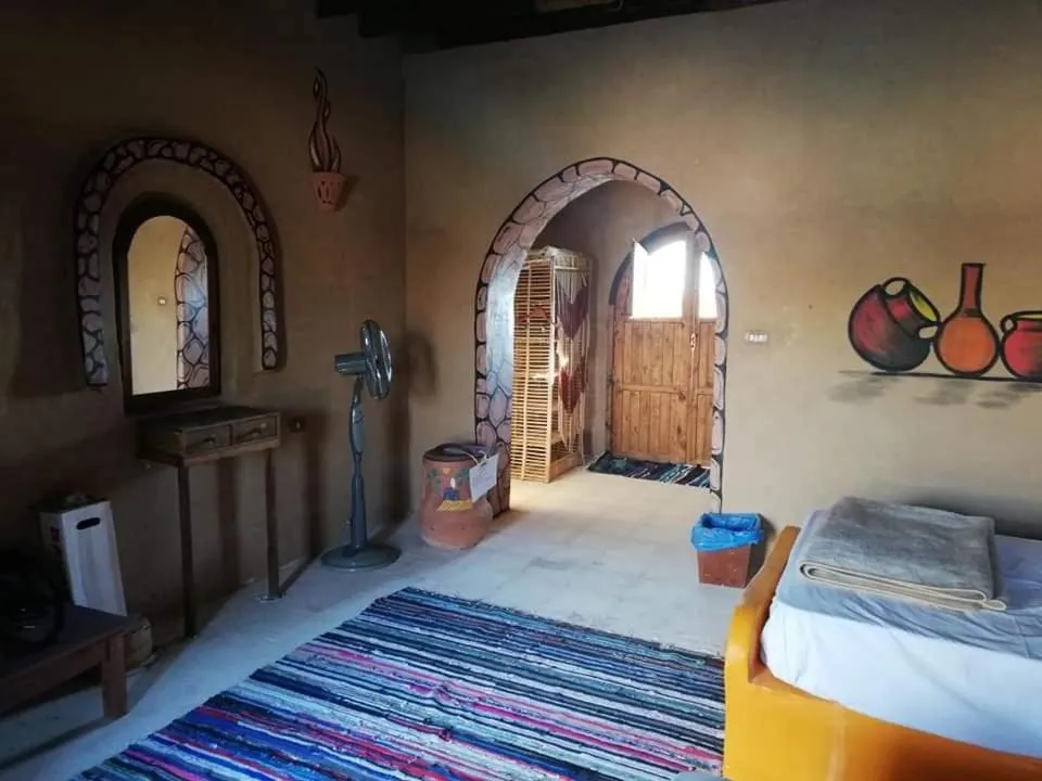 Bed in Qasr El Bagawat Hotel