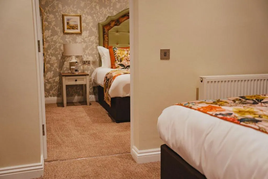 Bed in The Golden Fleece Hotel, Thirsk, North Yorkshire - The Coaching Inn Group