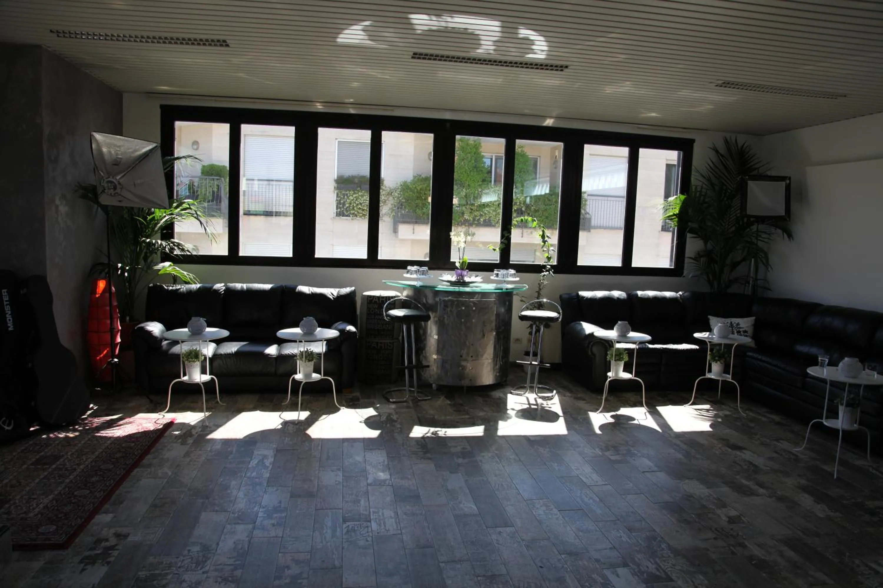 Communal lounge/ TV room in Atmos Luxe Navigli