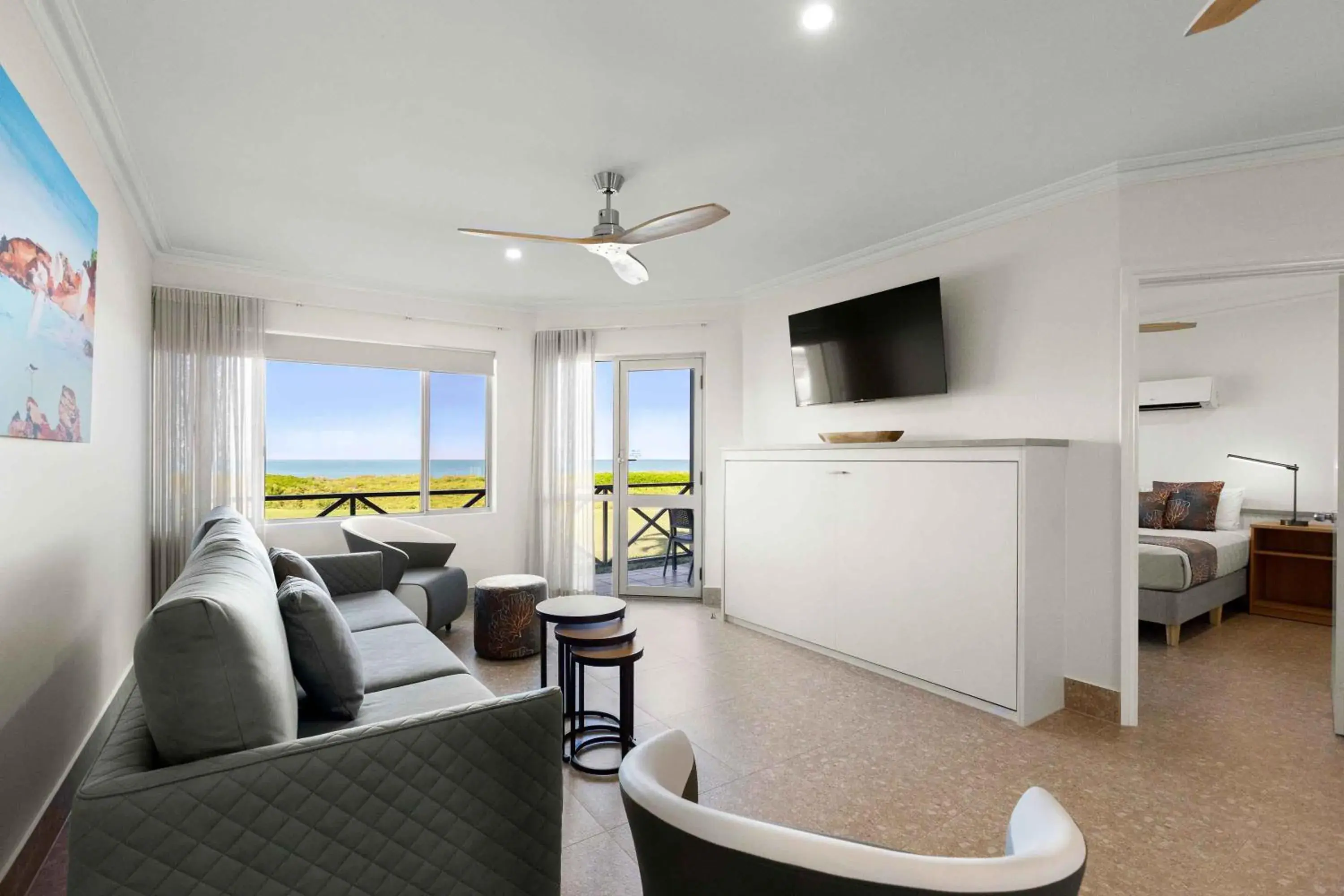 Living room, Bed in Moonlight Bay Suites Living room, Bed in Moonlight Bay Suites