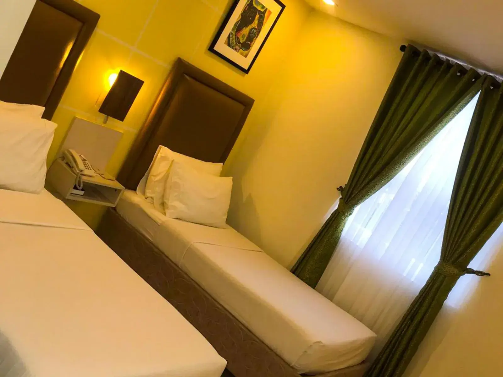 Photo of the whole room, Bed in Cebu Uncle Toms Cabin Hotel powered by Cocotel Photo of the whole room, Bed in Cebu Uncle Toms Cabin Hotel powered by Cocotel