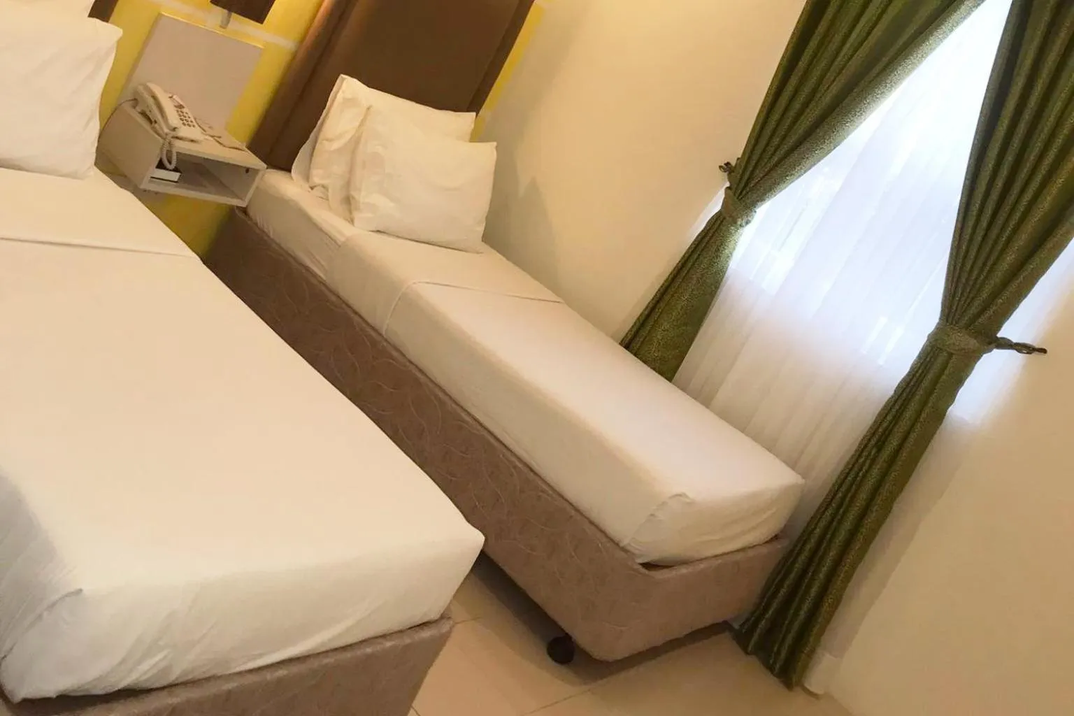 Bed in Cebu Uncle Toms Cabin Hotel powered by Cocotel