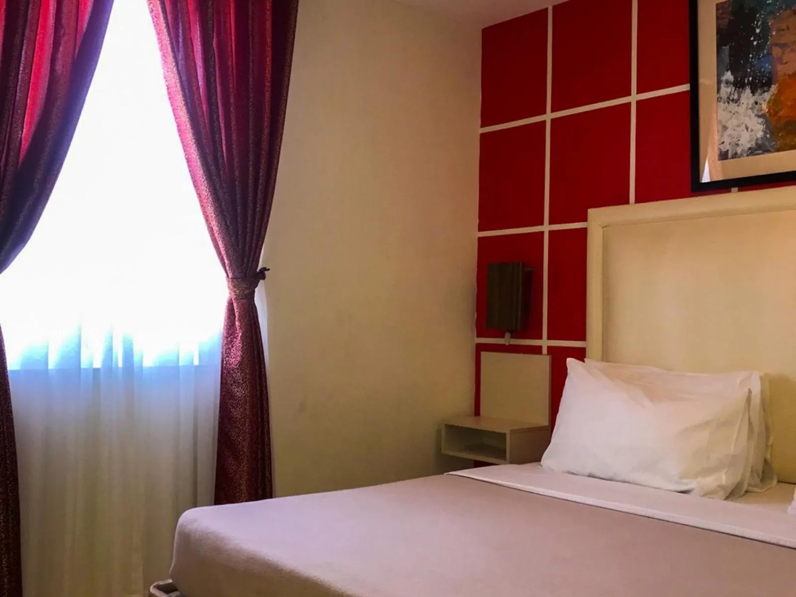 Bed in Cebu Uncle Toms Cabin Hotel powered by Cocotel