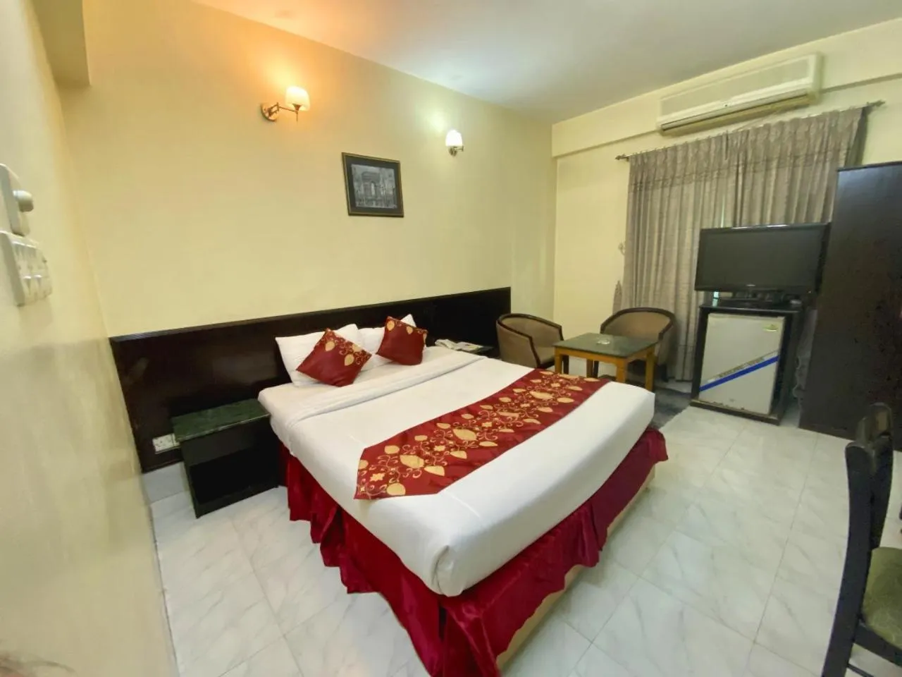 Bed in Quality Inn Dhaka