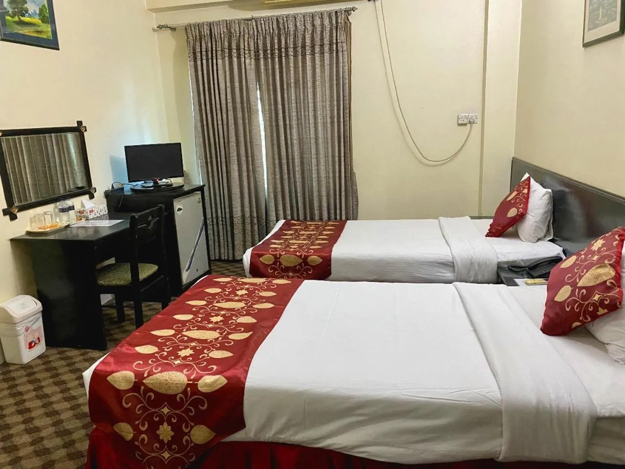 Bed in Quality Inn Dhaka