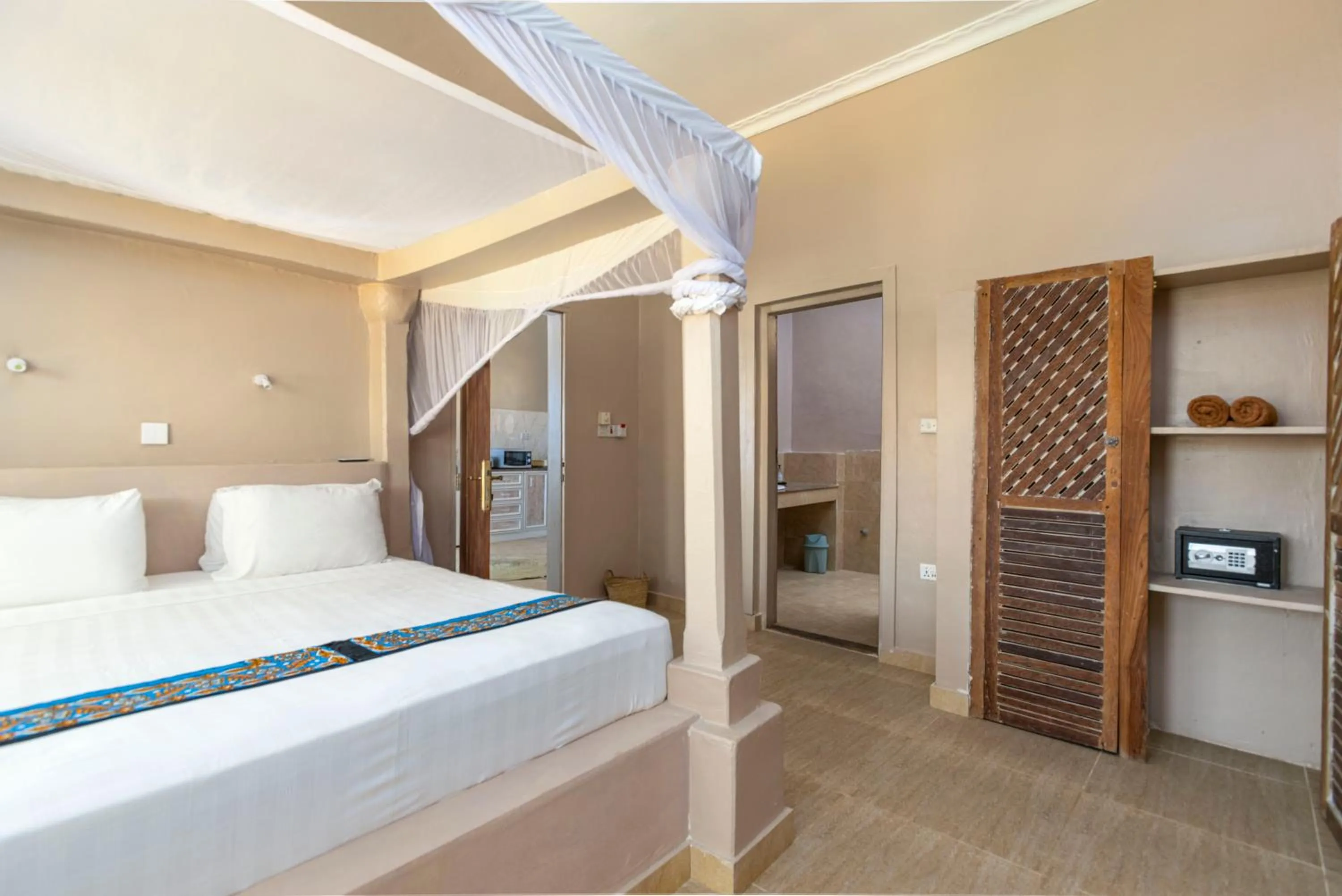 Bed in Paje Beach Apartments & Hotel