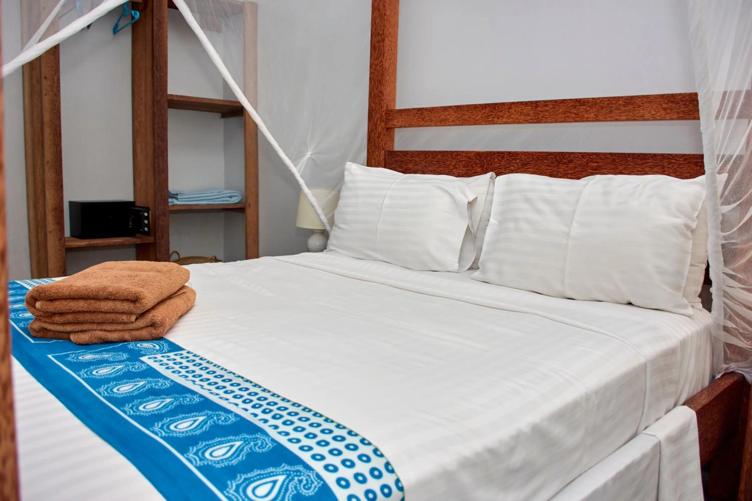 Bed in Paje Beach Apartments & Hotel