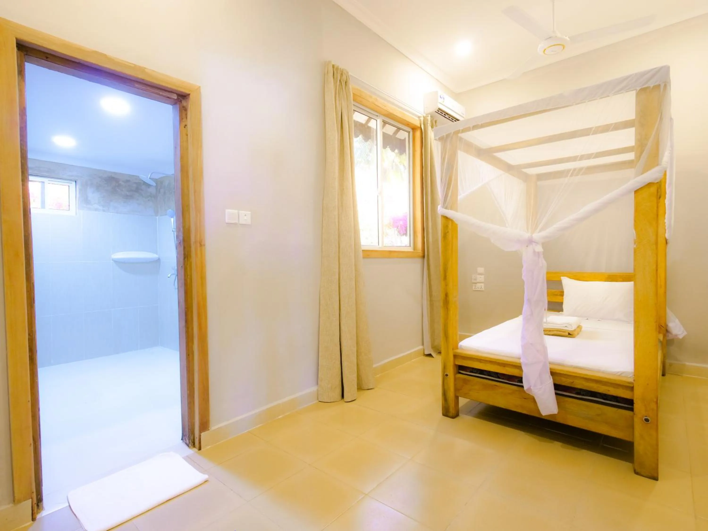 Photo of the whole room, Bed in Paje Beach Apartments & Hotel