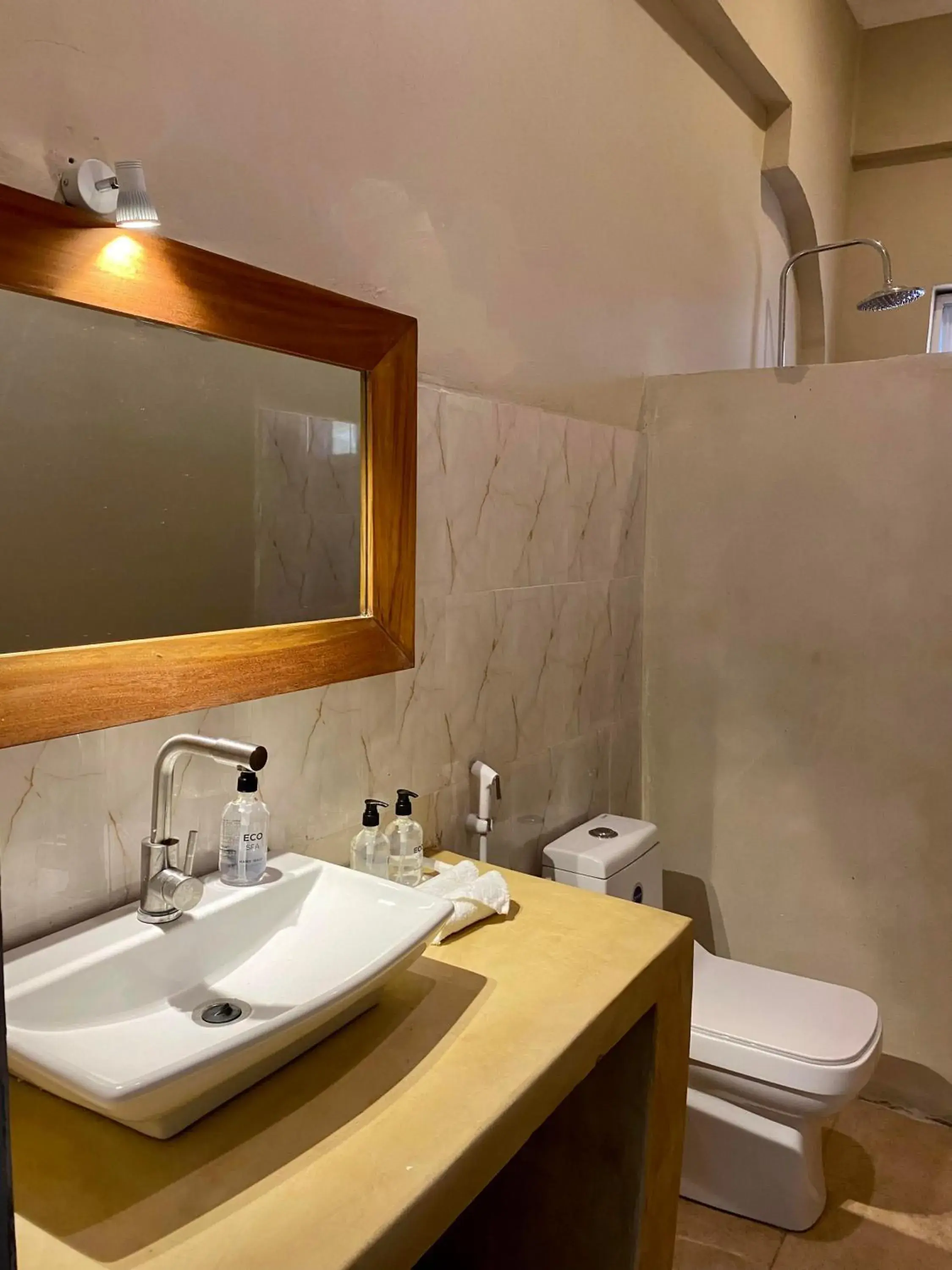 Bathroom in Paje Beach Apartments & Hotel Bathroom in Paje Beach Apartments & Hotel