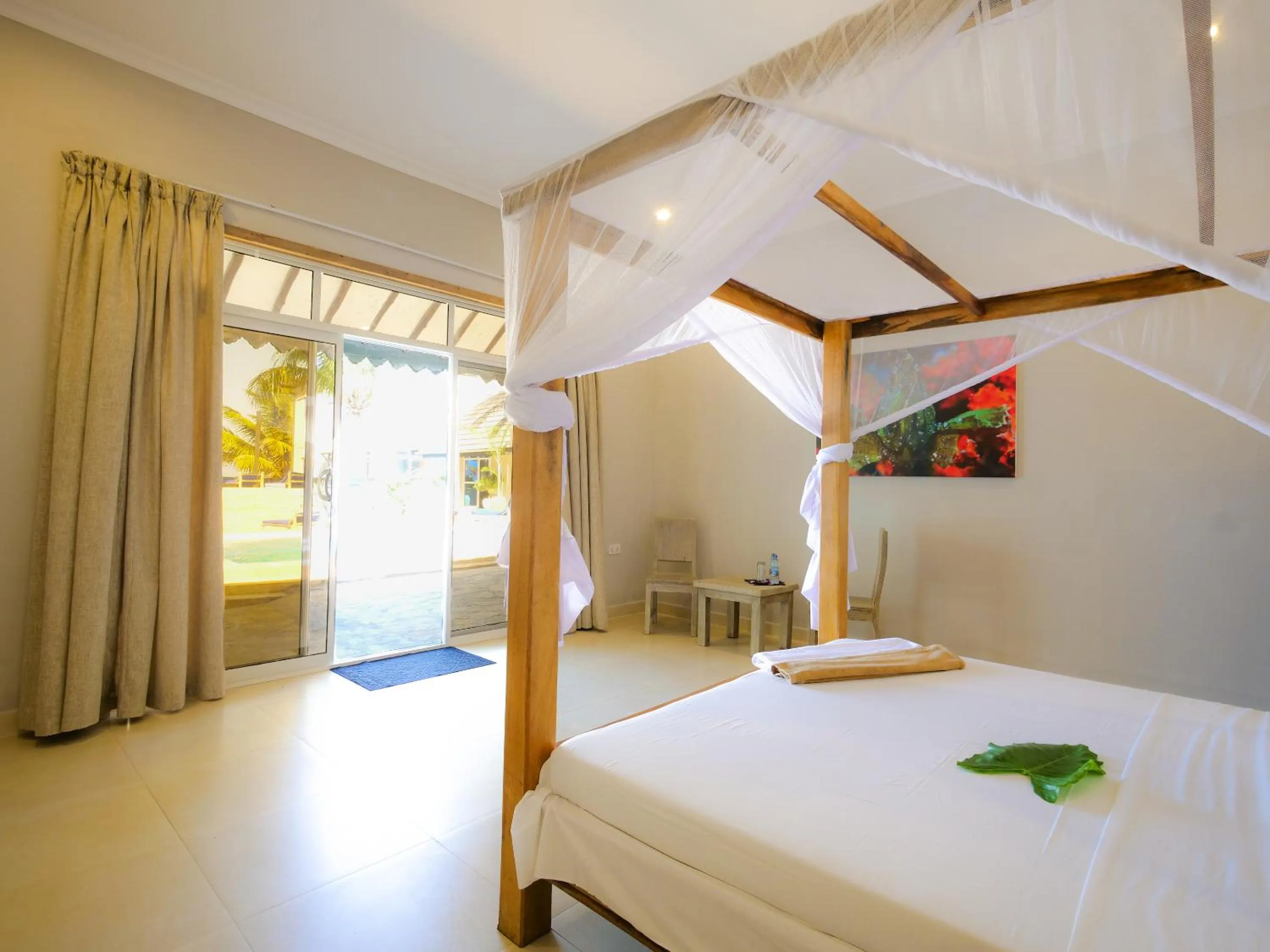 Bed in Paje Beach Apartments & Hotel