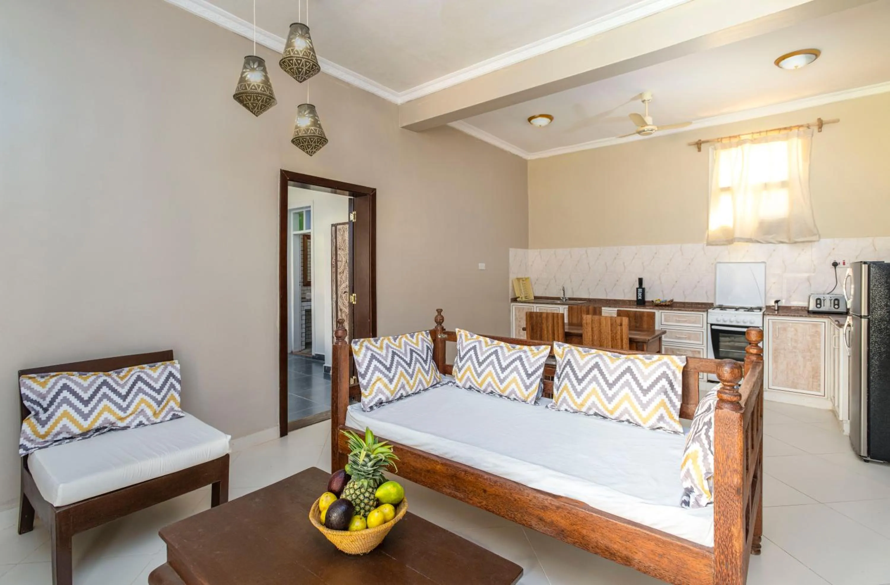 Kitchen or kitchenette, Bed in Paje Beach Apartments & Hotel