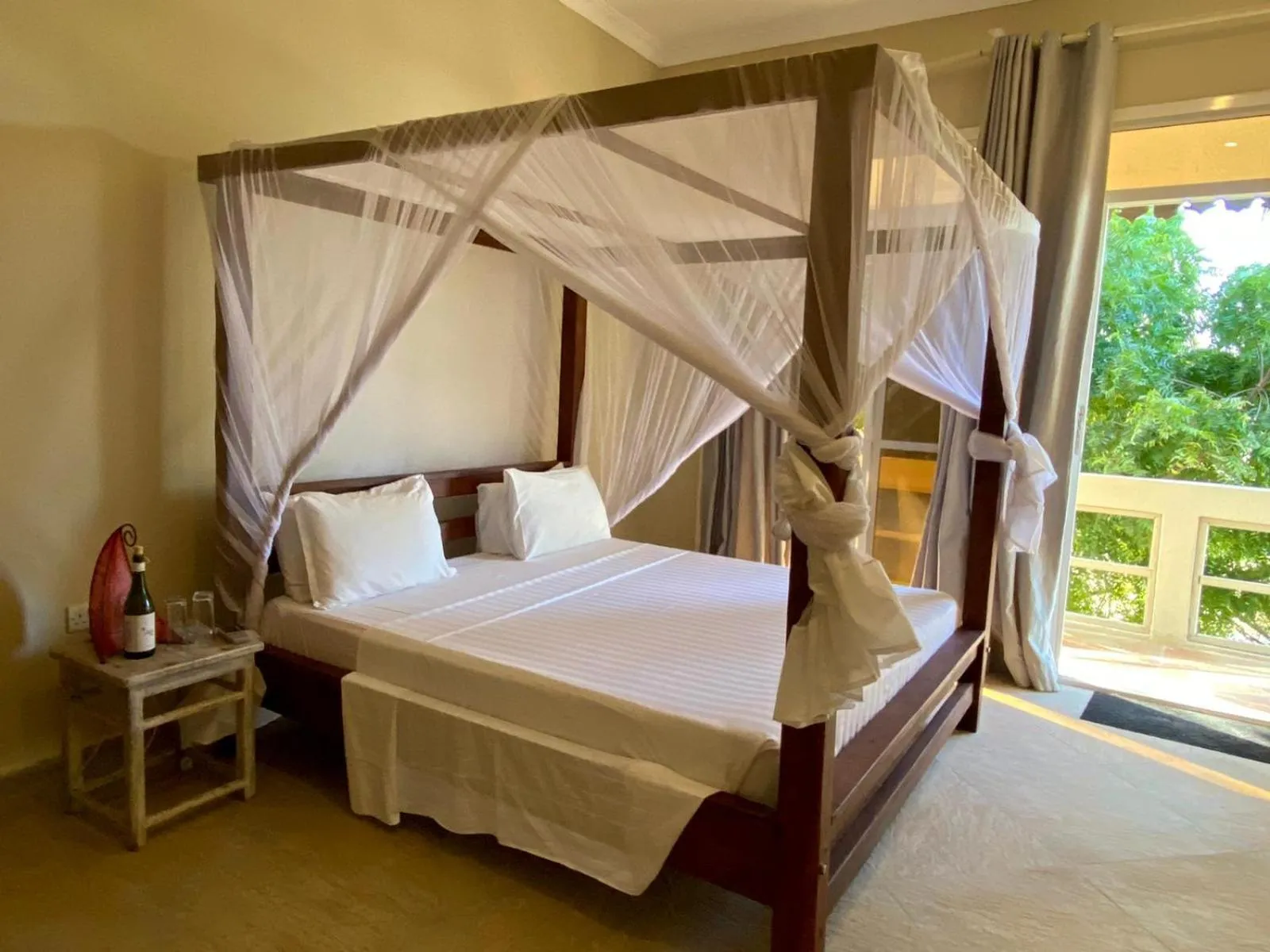 Bed in Paje Beach Apartments & Hotel