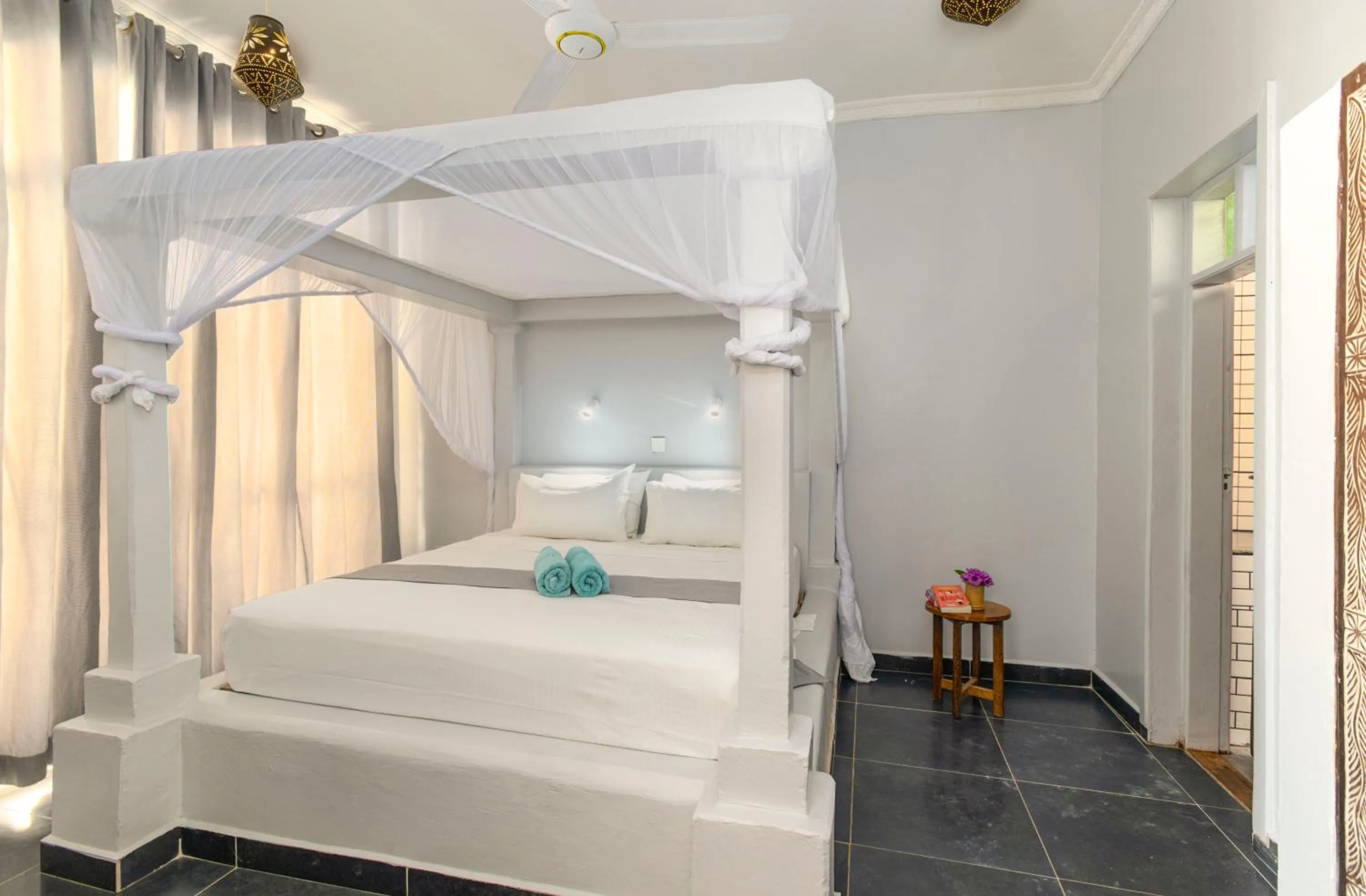 Bed in Paje Beach Apartments & Hotel