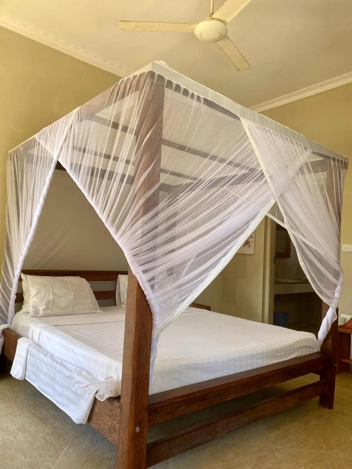 Bed in Paje Beach Apartments & Hotel