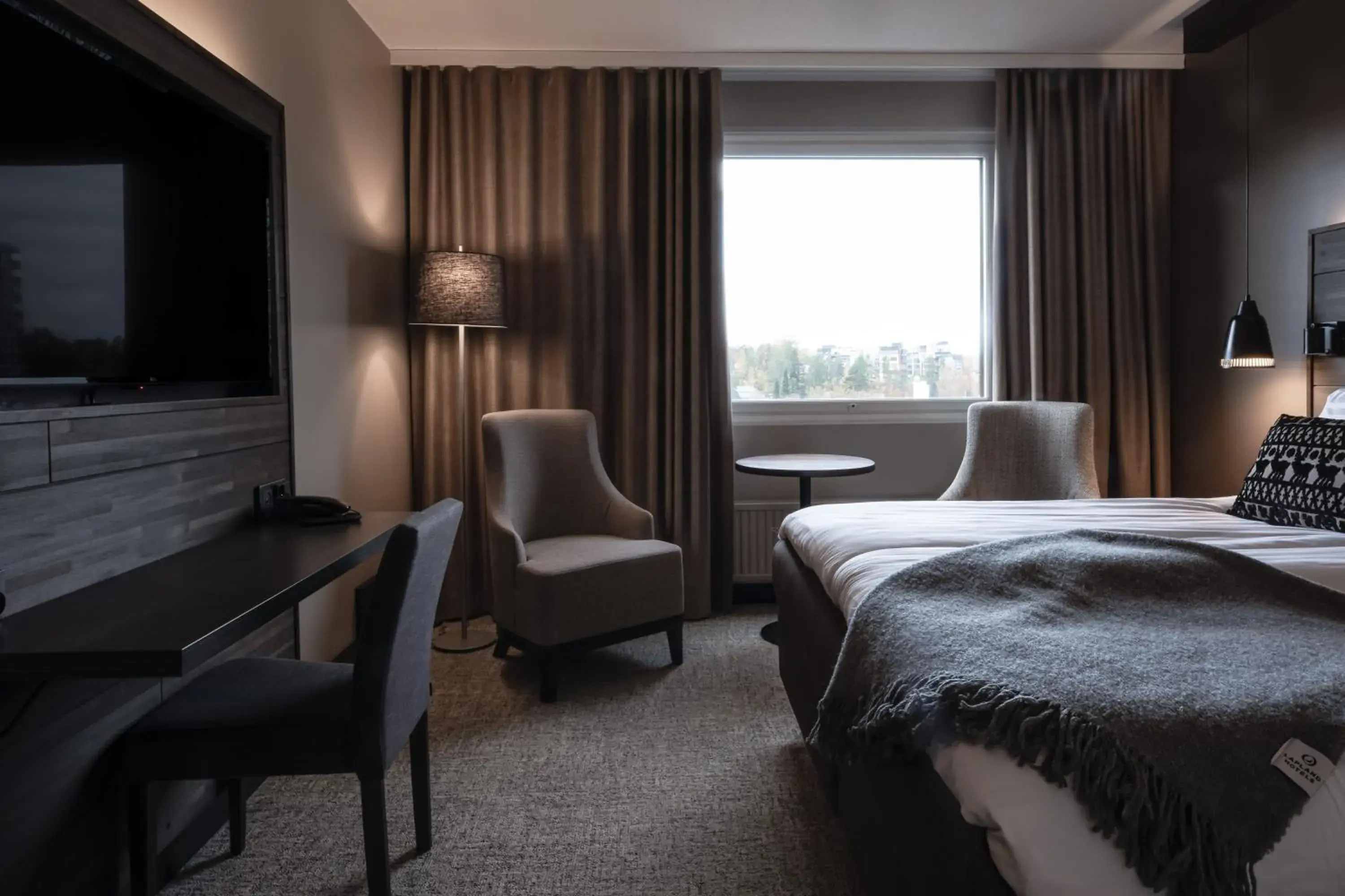 Photo of the whole room, Bed in Lapland Hotels Kuopio Photo of the whole room, Bed in Lapland Hotels Kuopio