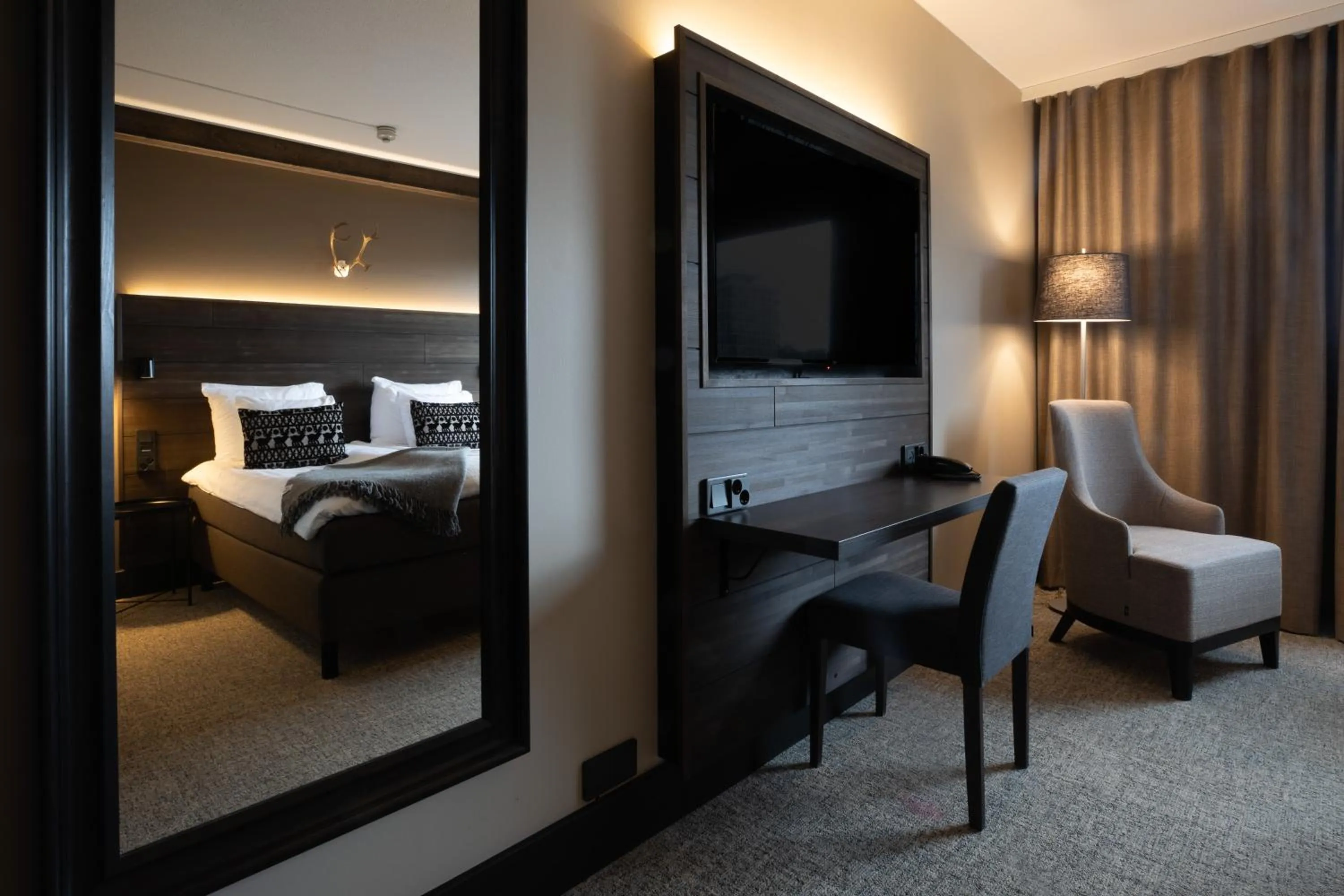 TV and multimedia, Bed in Lapland Hotels Kuopio