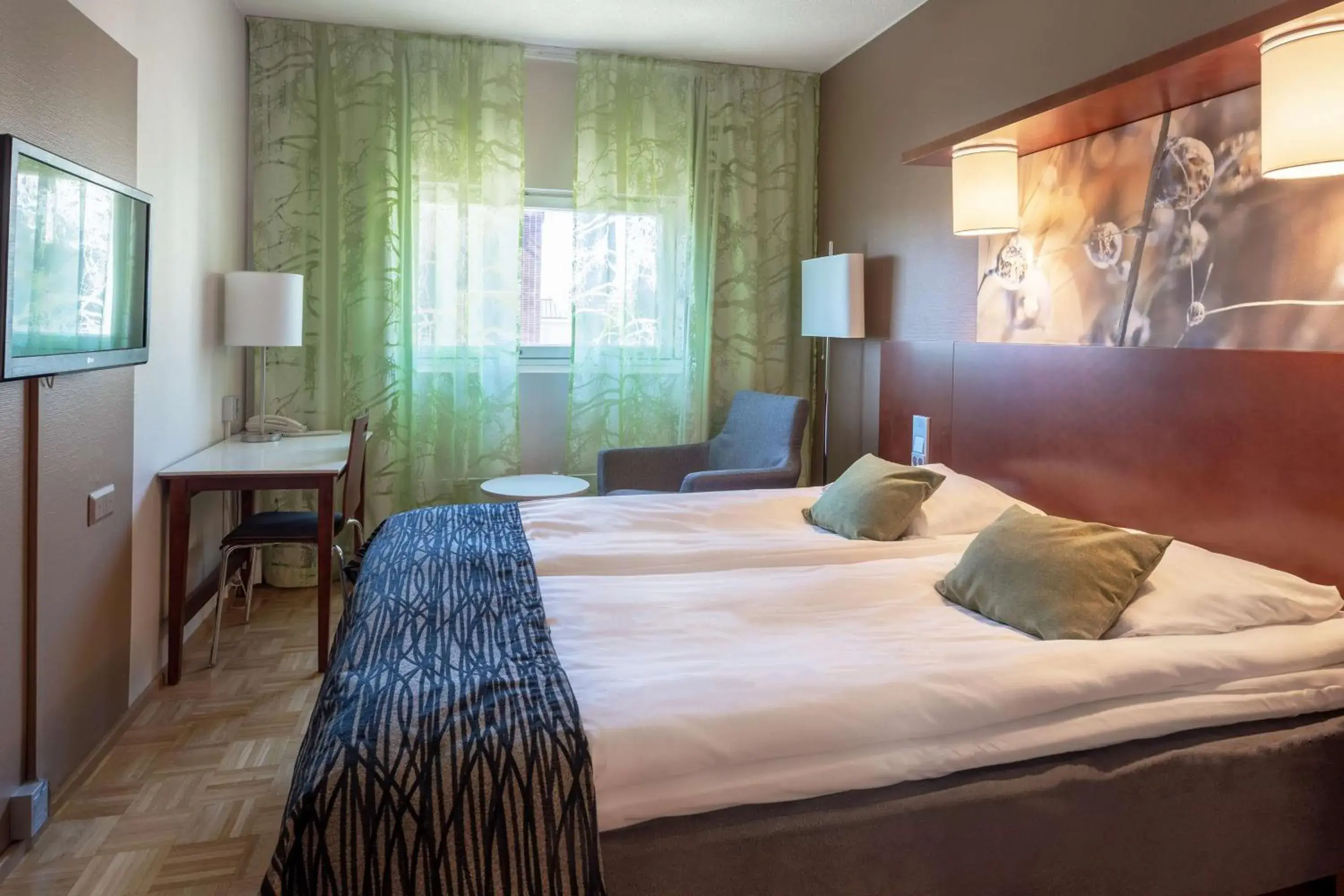 Photo of the whole room, Bed in Scandic Jyväskylä City Photo of the whole room, Bed in Scandic Jyväskylä City