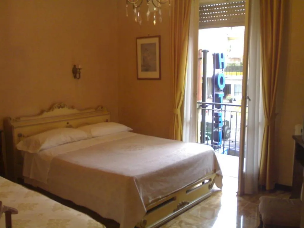 Photo of the whole room, Bed in Hotel Pescetto