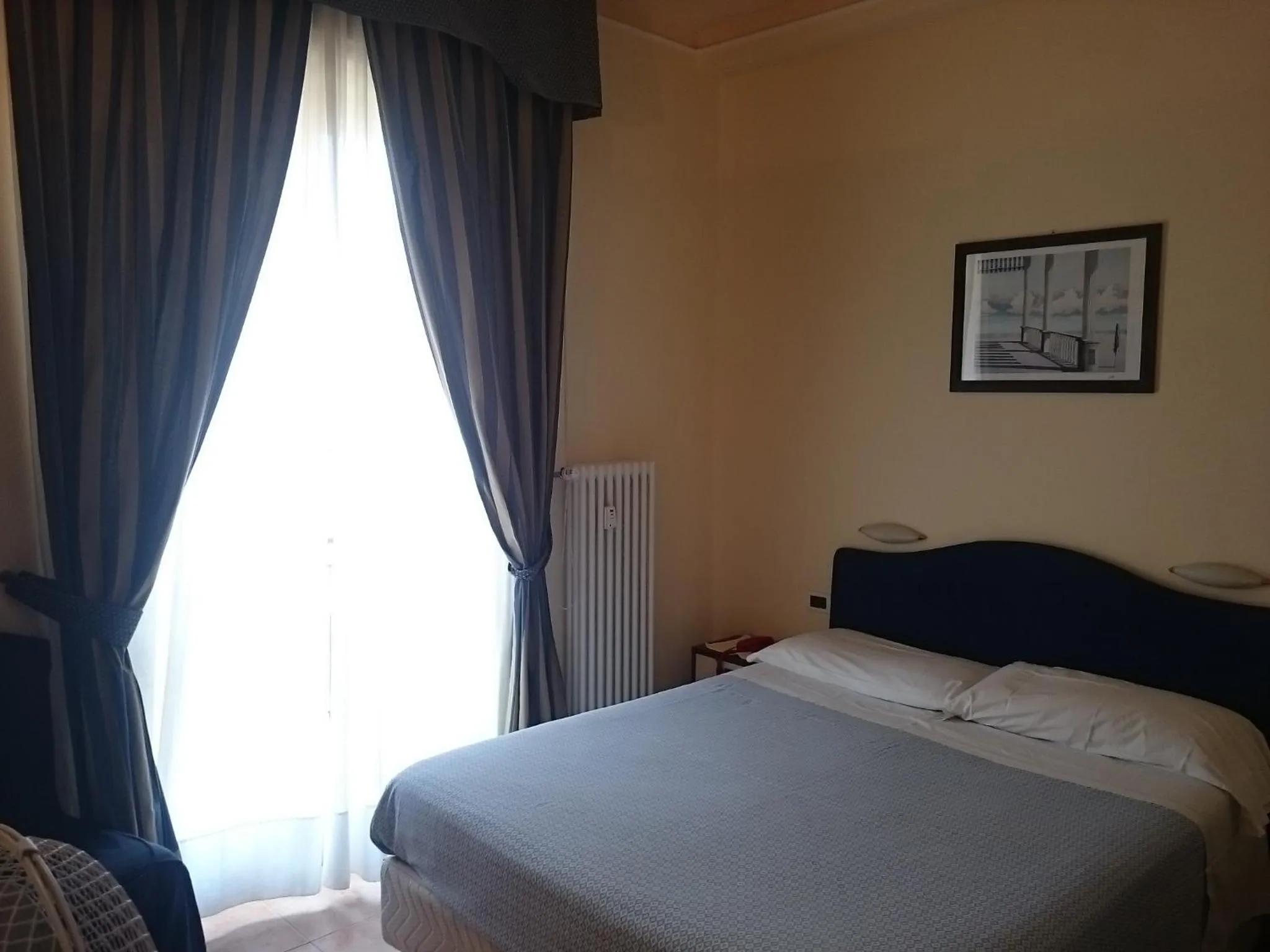 Photo of the whole room, Bed in Hotel Pescetto
