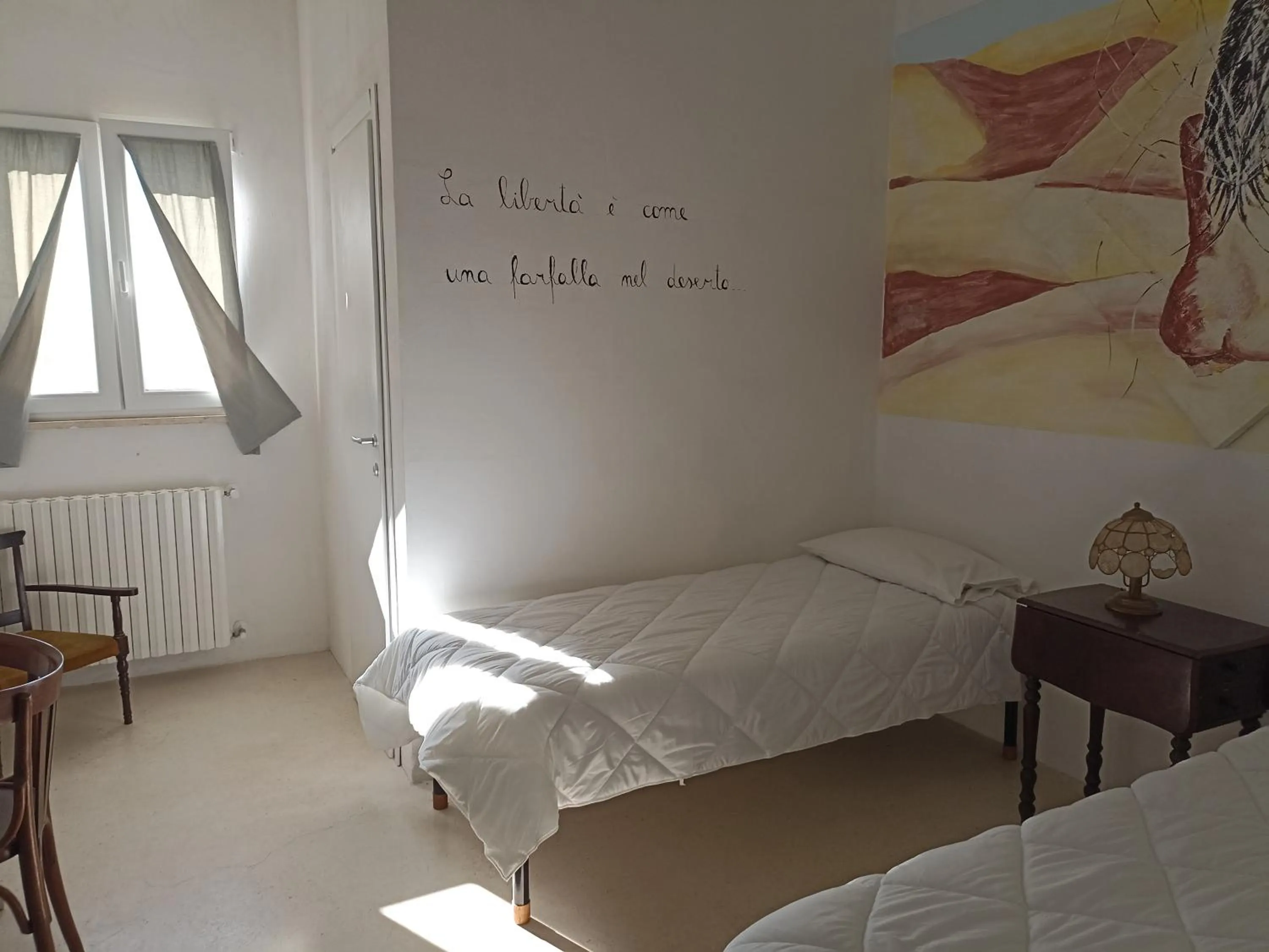 Photo of the whole room, Bed in La casa degli artisti