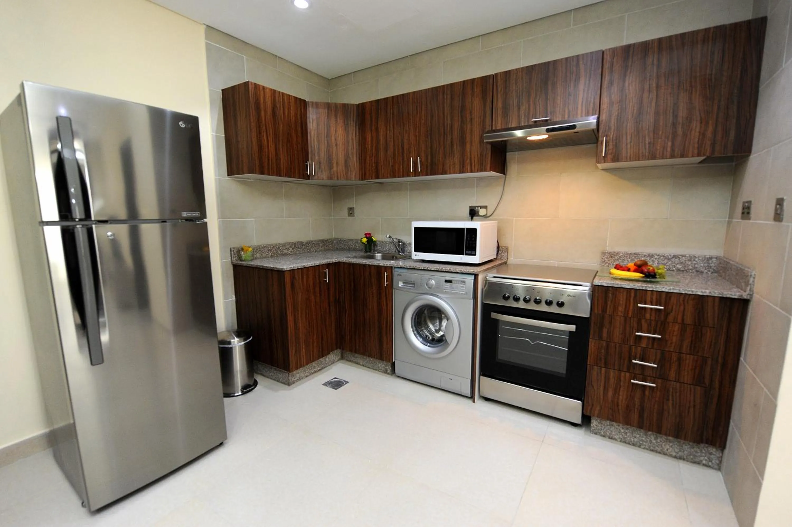 Kitchen or kitchenette in Al Mansour Park Inn Hotel&Apartment