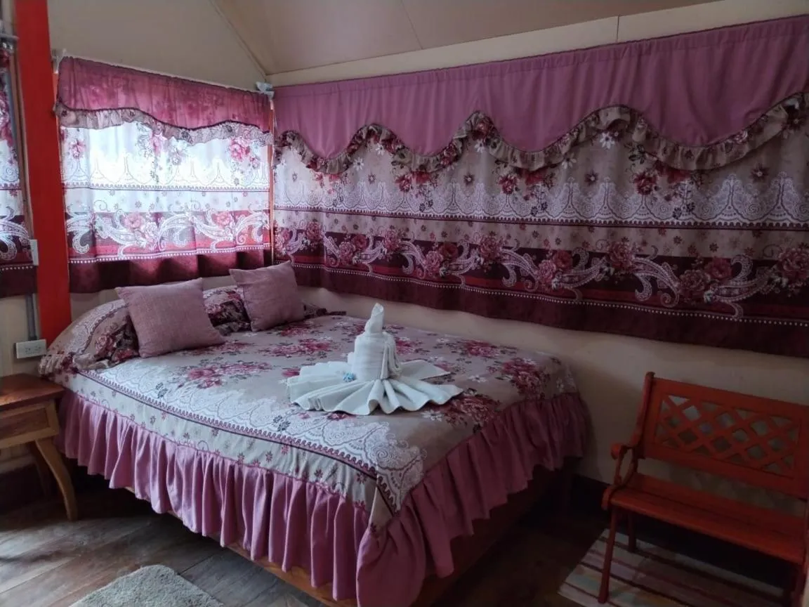 Bed in Pensión y Cabinas Colibrí B&B Costa Rica