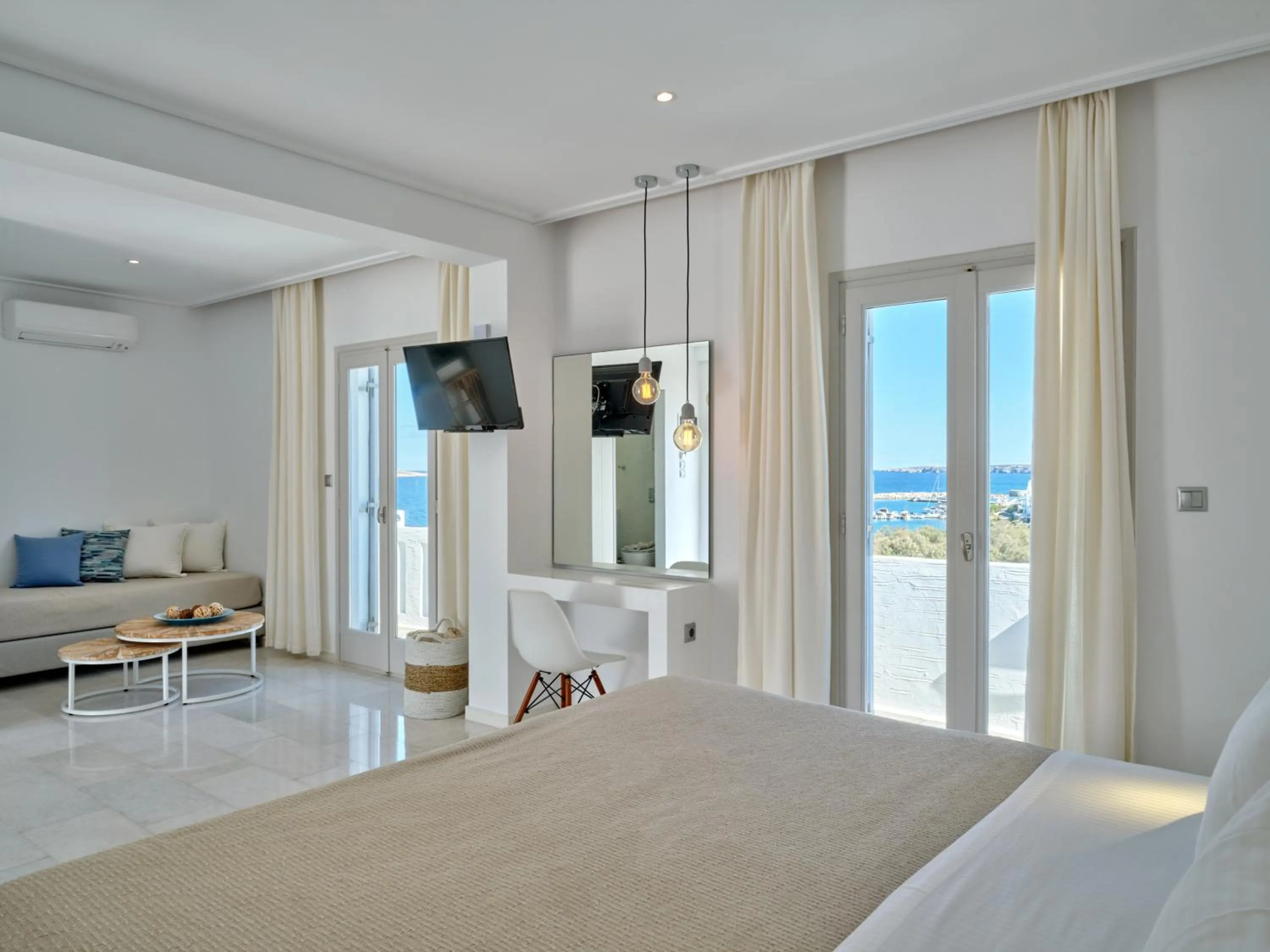 Bed in Kanale's Rooms & Suites