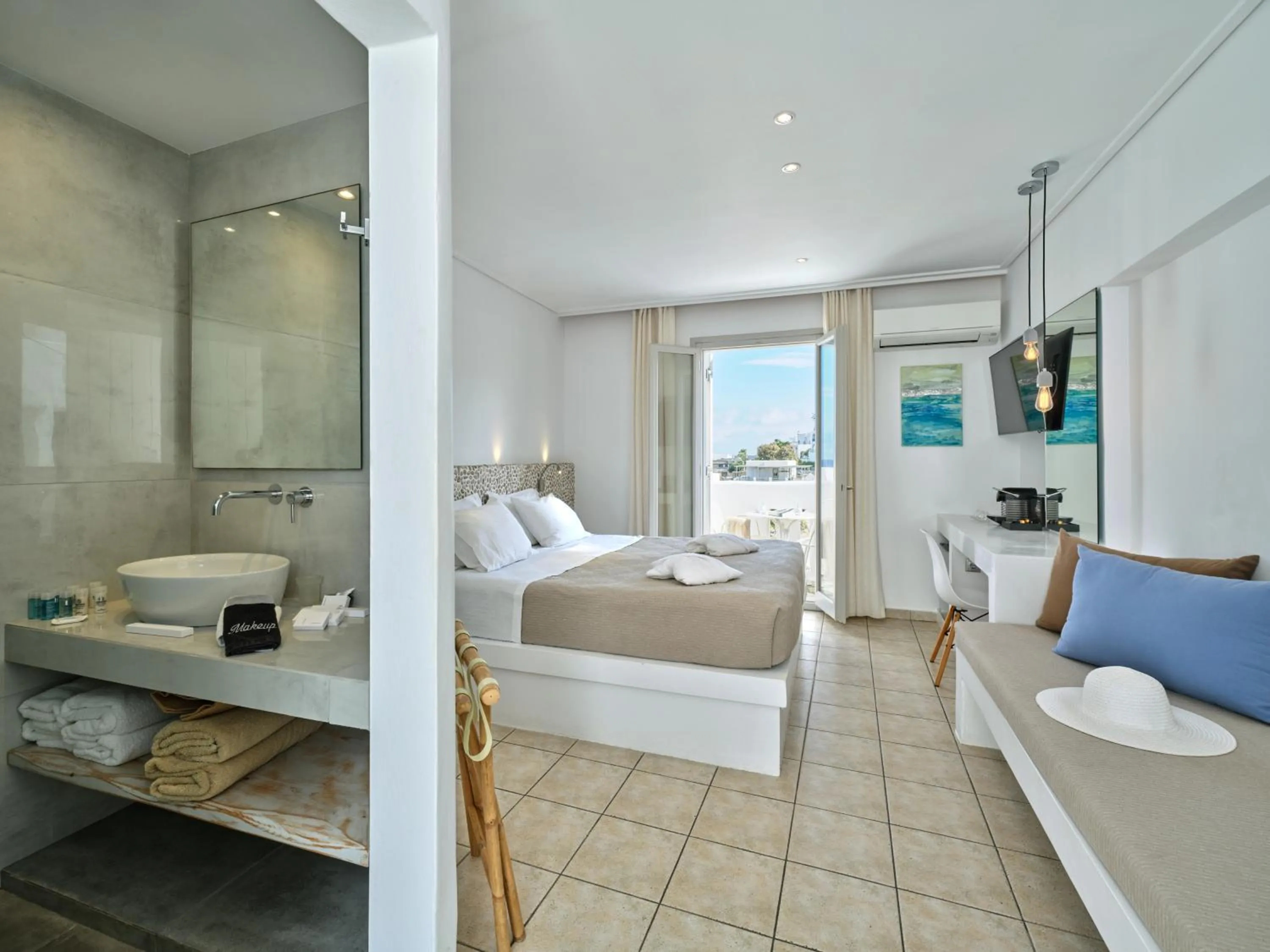 Bed in Kanale's Rooms & Suites