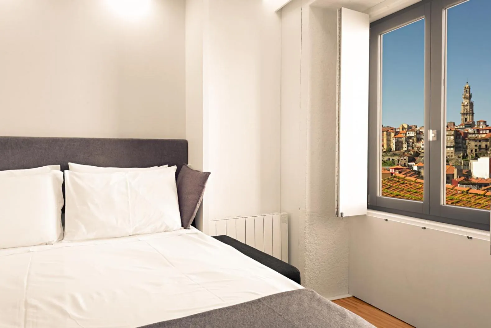 Bed in Cathedral Design Apartments