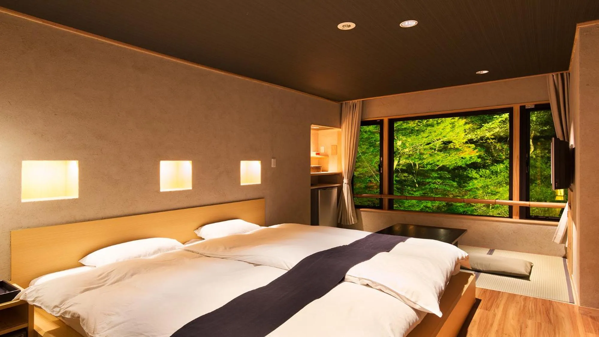 Bed in Aizu Higashiyama Onsen Shosuke no Yado Takinoyu since1880