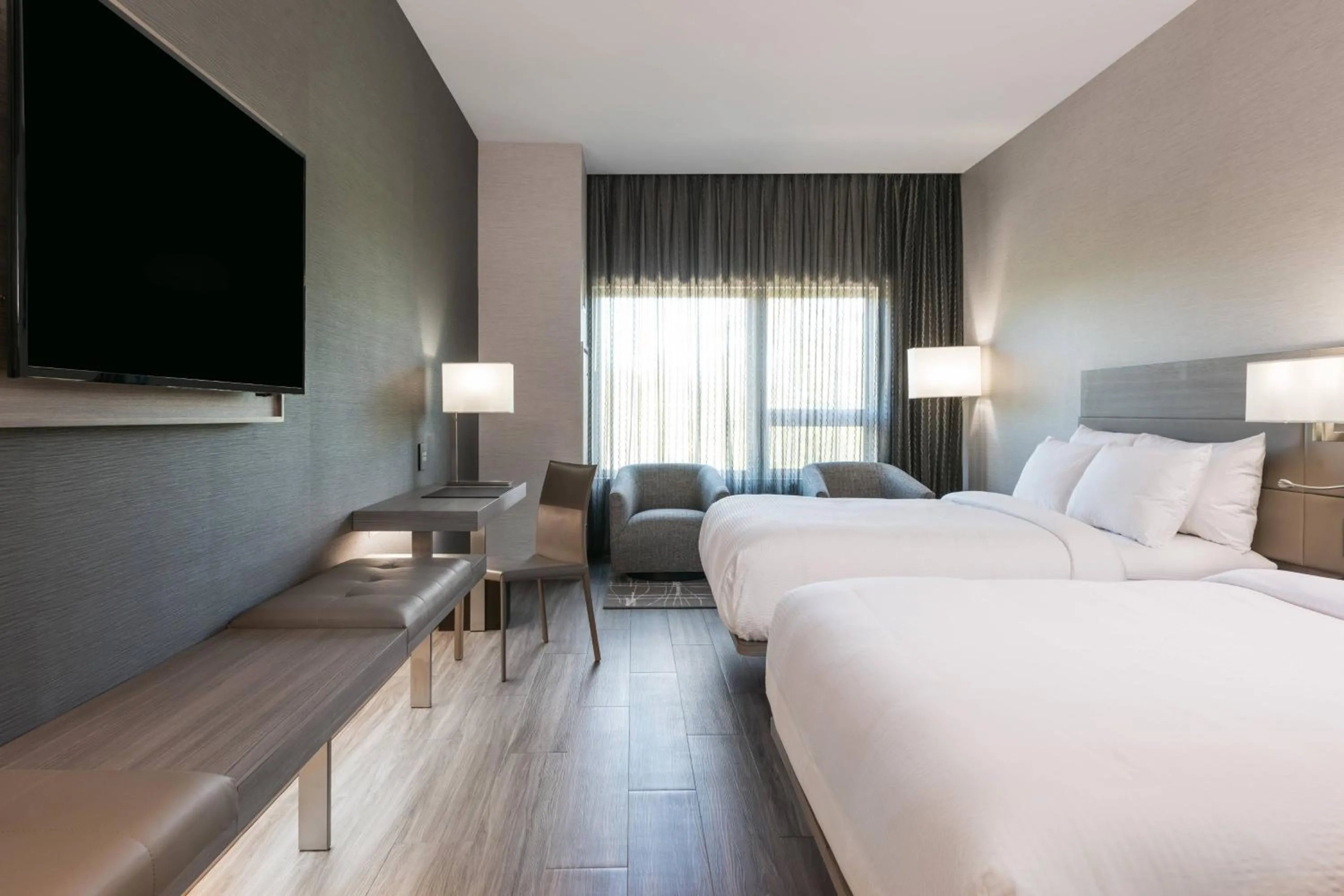 Photo of the whole room, Bed in AC Hotel by Marriott Boston Cambridge