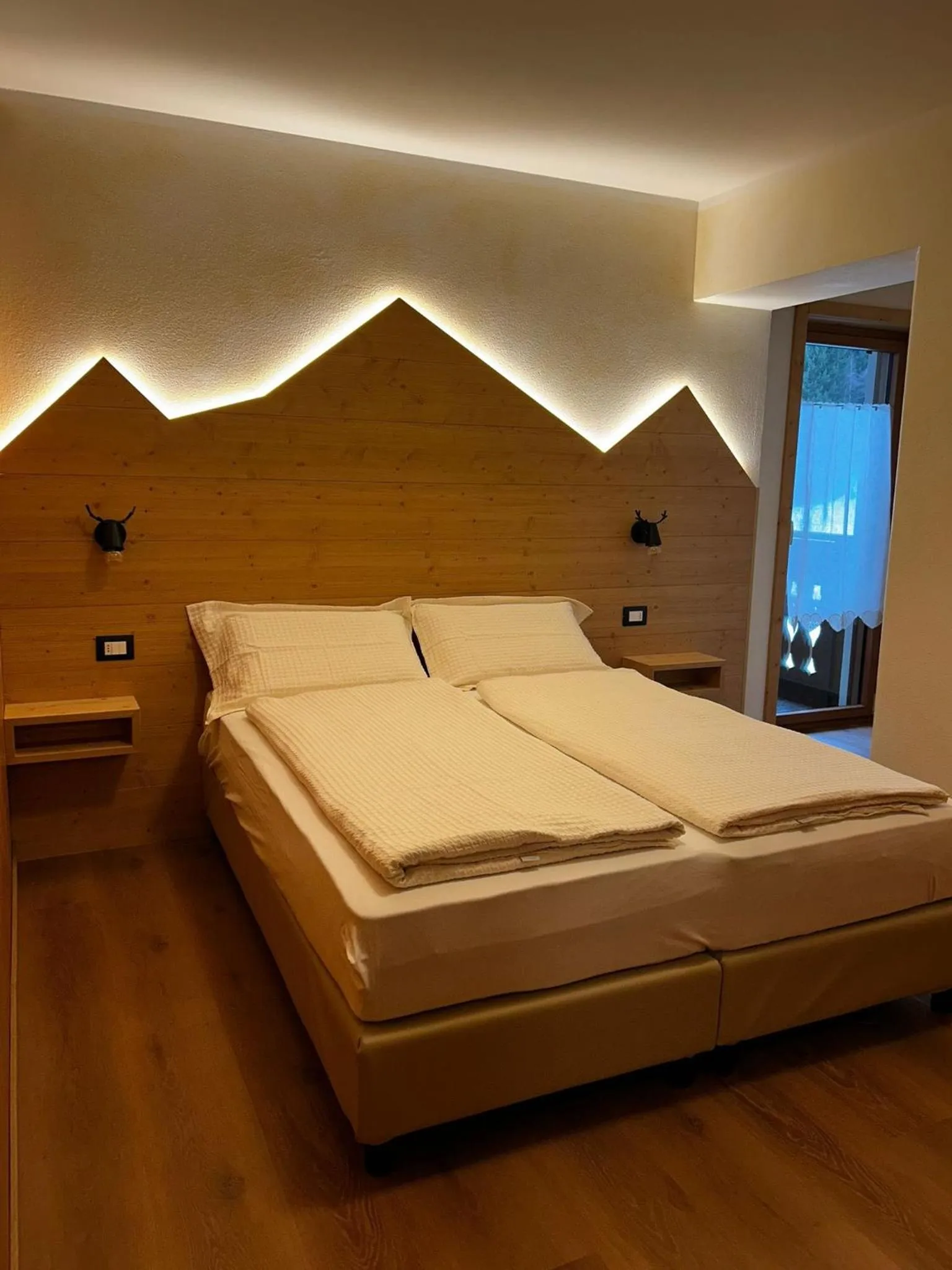 Bed in Rosengarden Alpine Residence