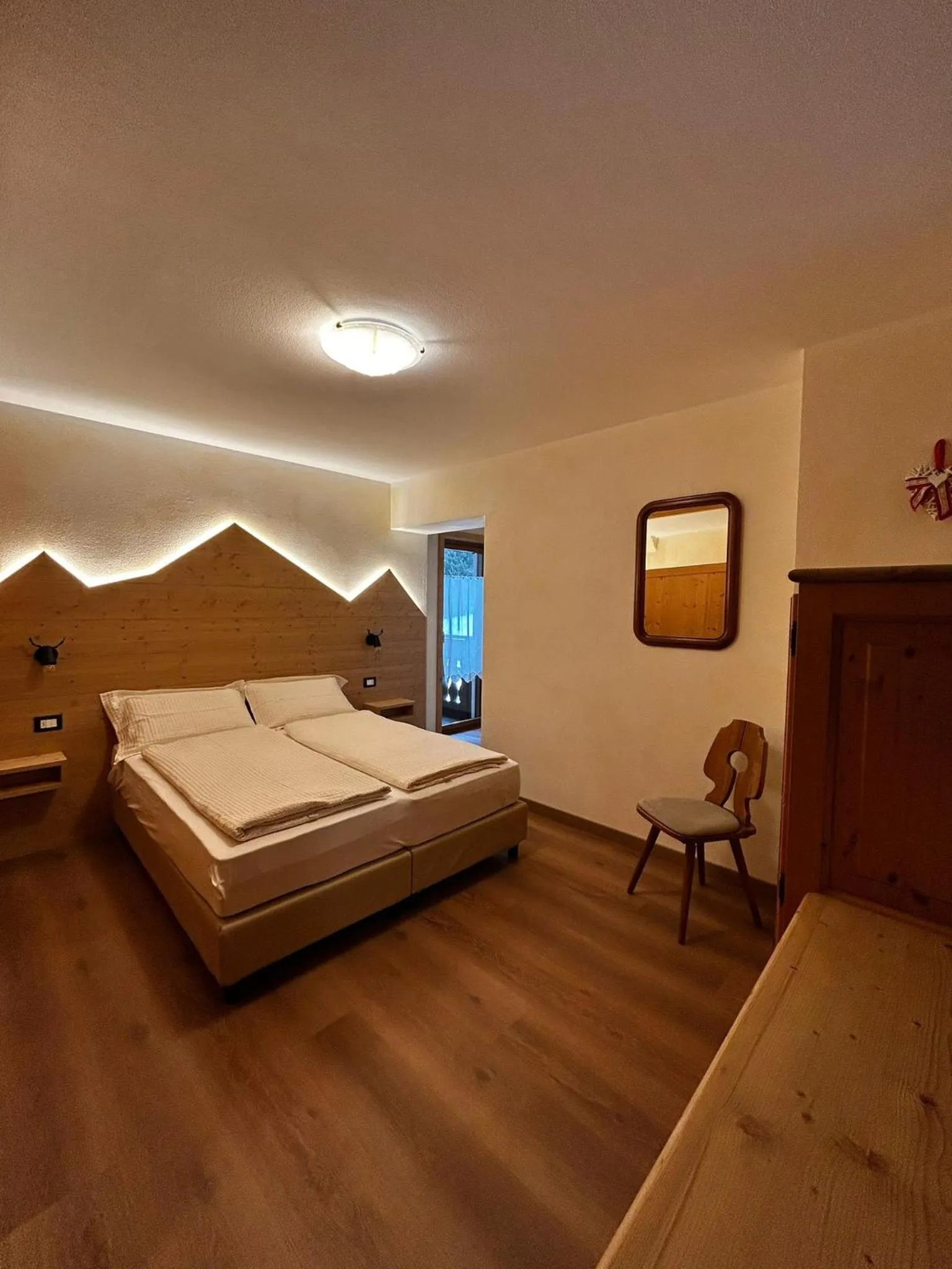 Bed in Rosengarden Alpine Residence