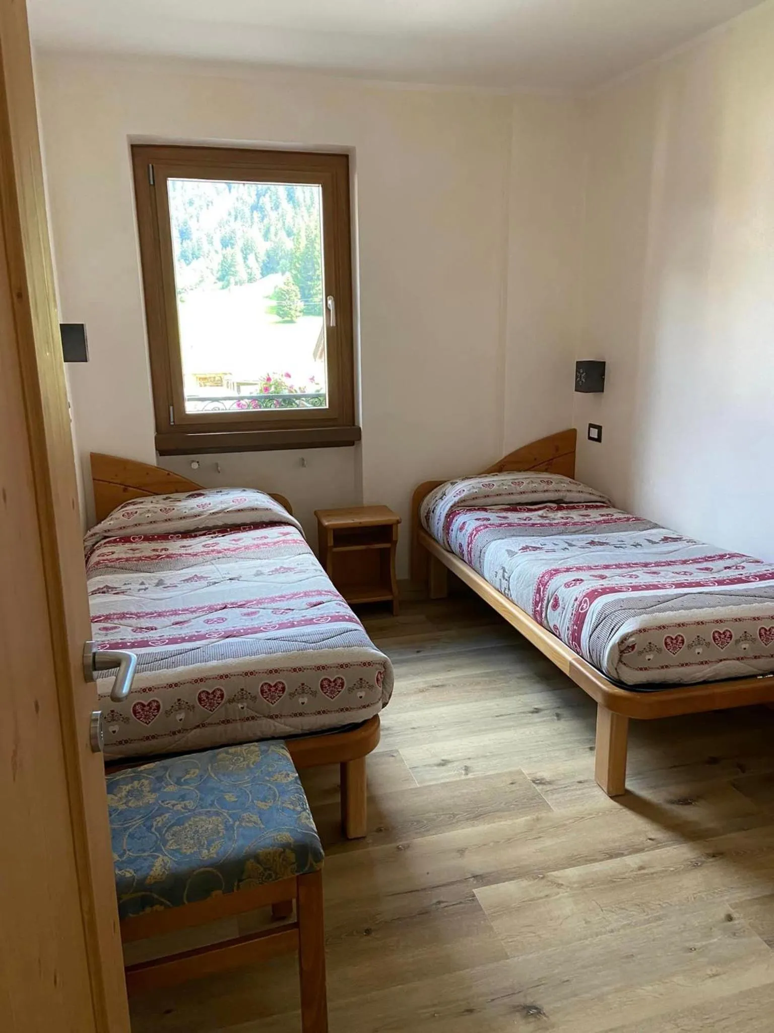 Bed in Rosengarden Alpine Residence