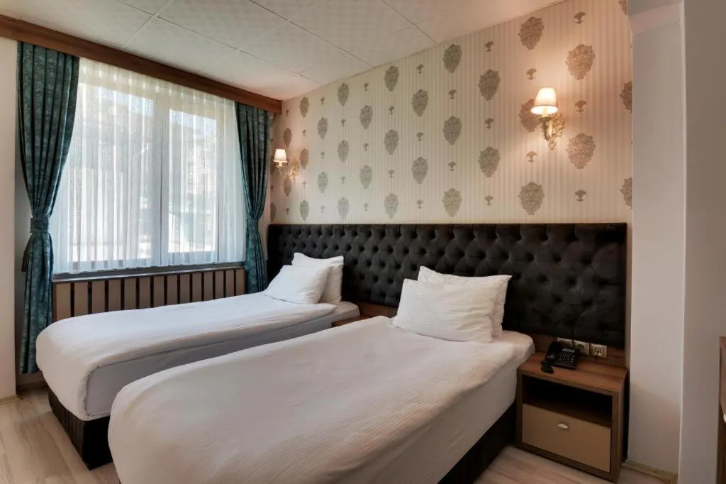 Bedroom, Bed in Grande Stella Hotel