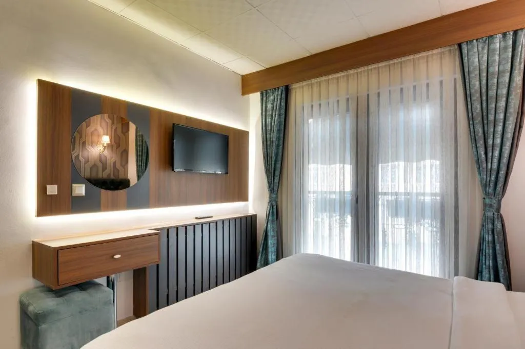 Bedroom, Bed in Grande Stella Hotel