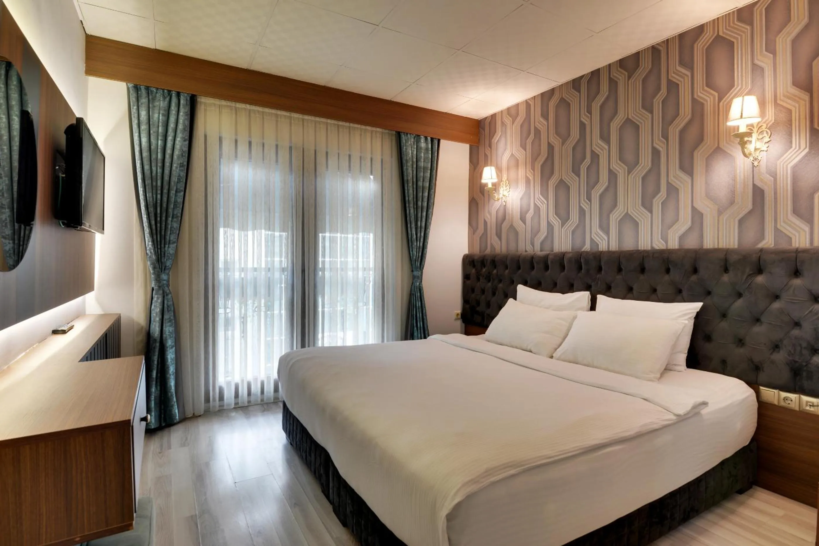 Bedroom, Bed in Grande Stella Hotel