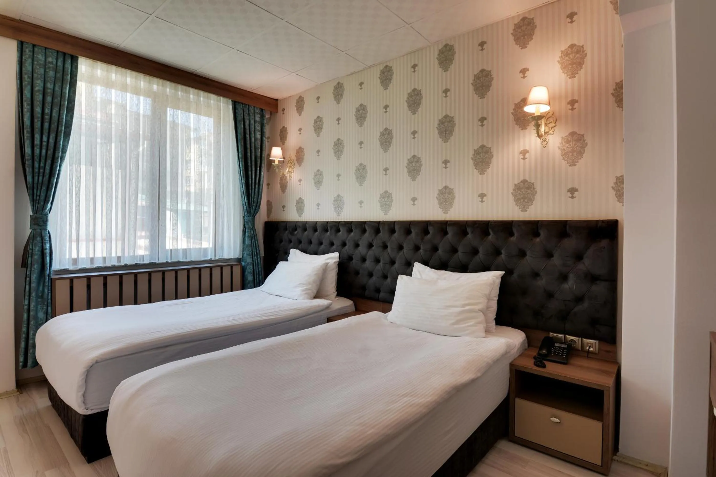 Bedroom, Bed in Grande Stella Hotel