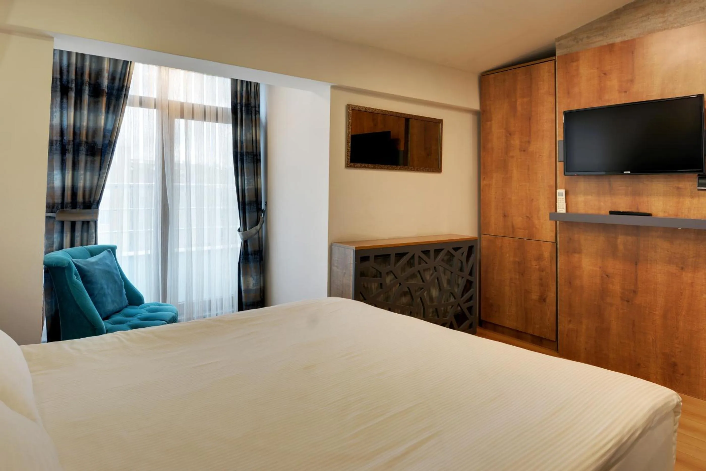 Bedroom, Bed in Grande Stella Hotel