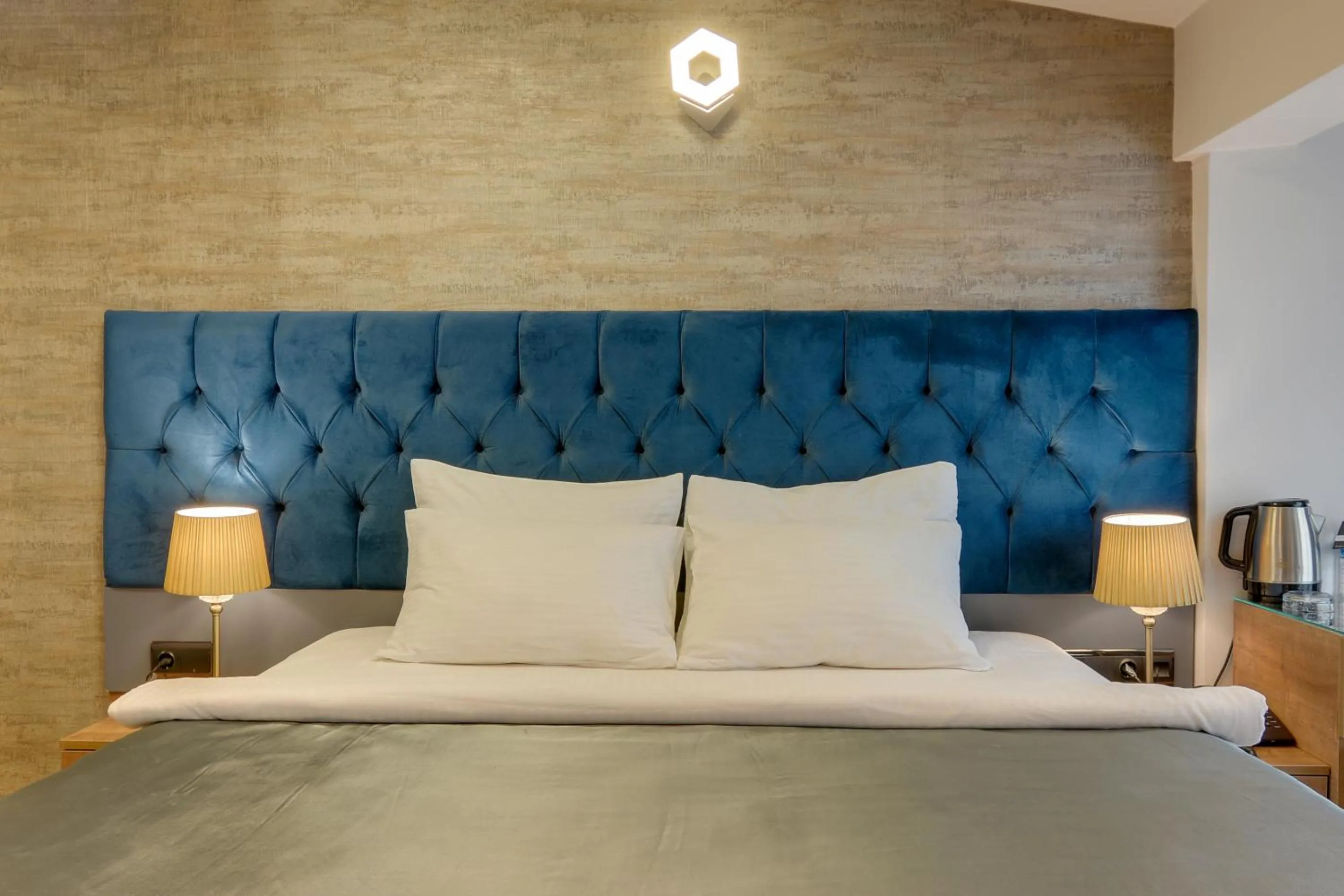 Bed in Grande Stella Hotel