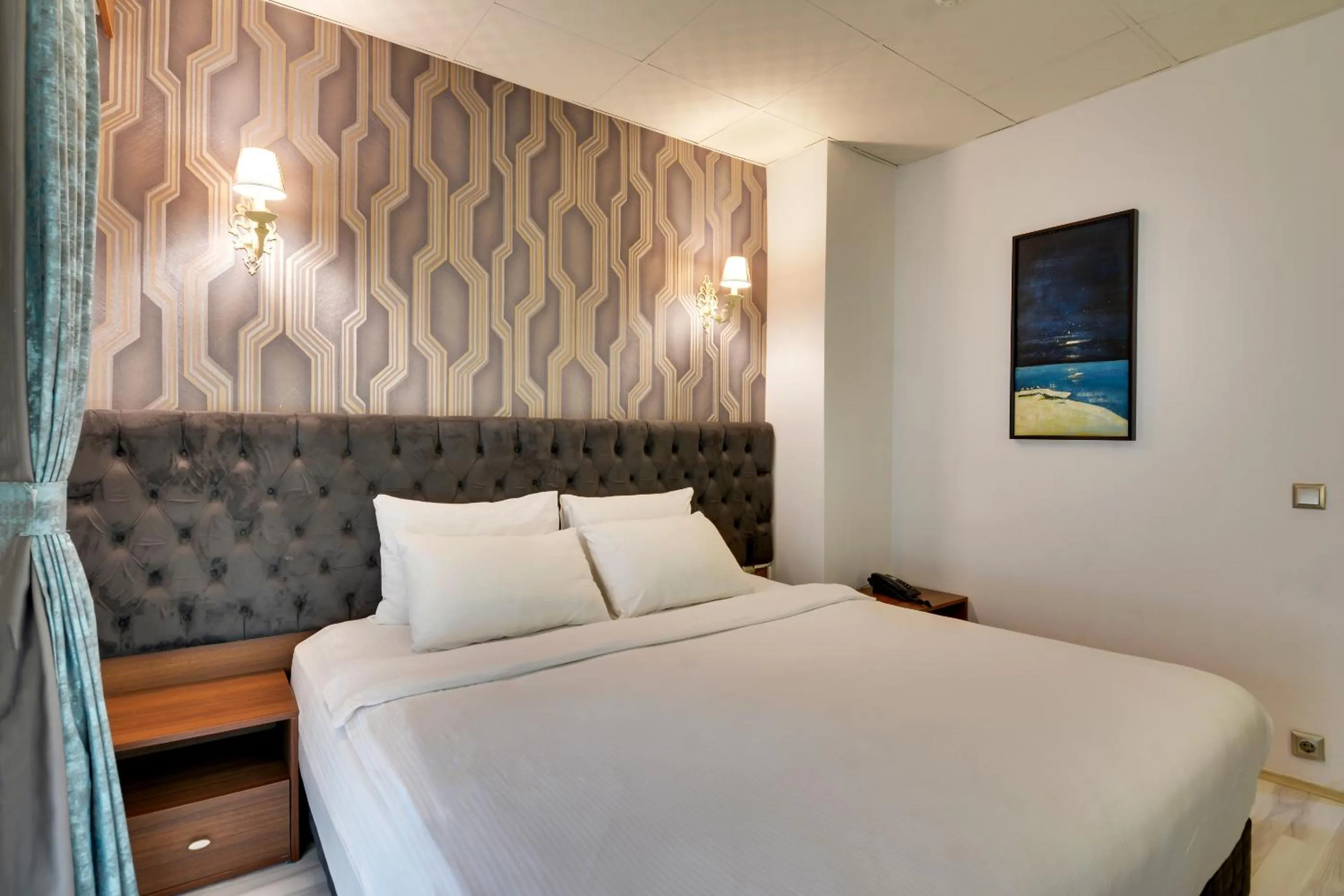 Bed in Grande Stella Hotel