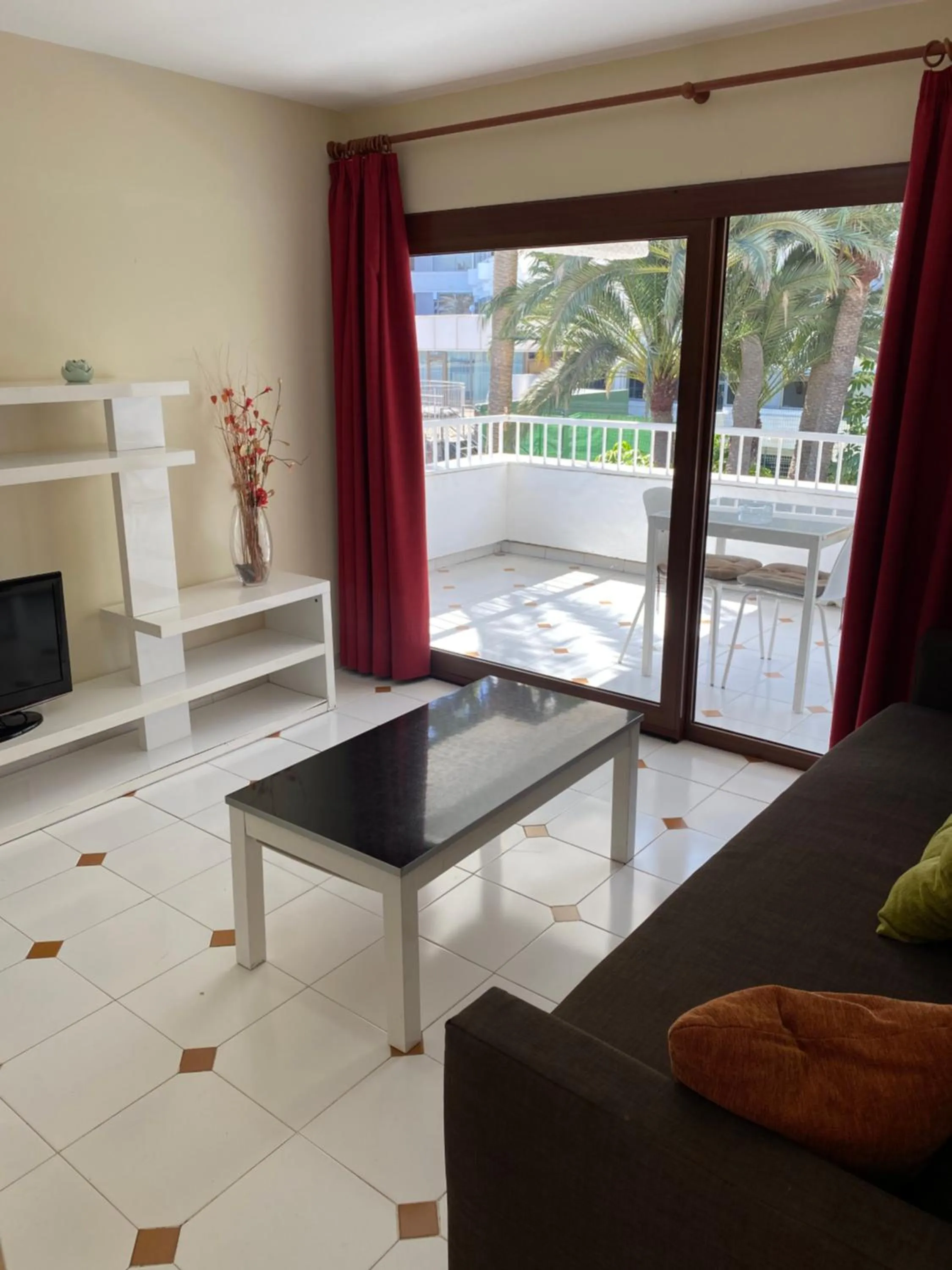 Living room, Pool View in Apartamentos Maspalomas Oasis