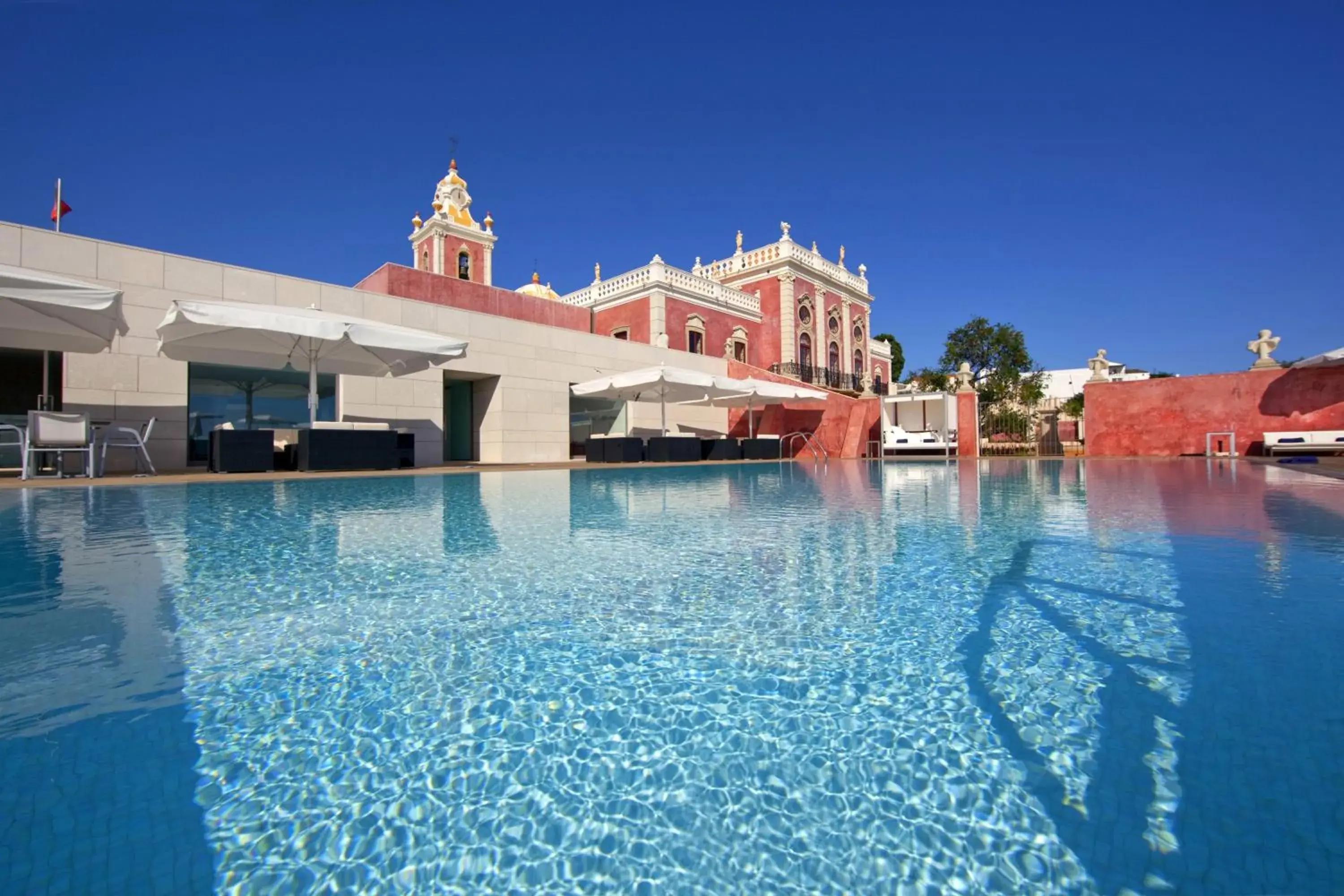 Swimming pool in Pousada Palacio de Estoi – Small Luxury Hotels of the World Swimming pool in Pousada Palacio de Estoi – Small Luxury Hotels of the World
