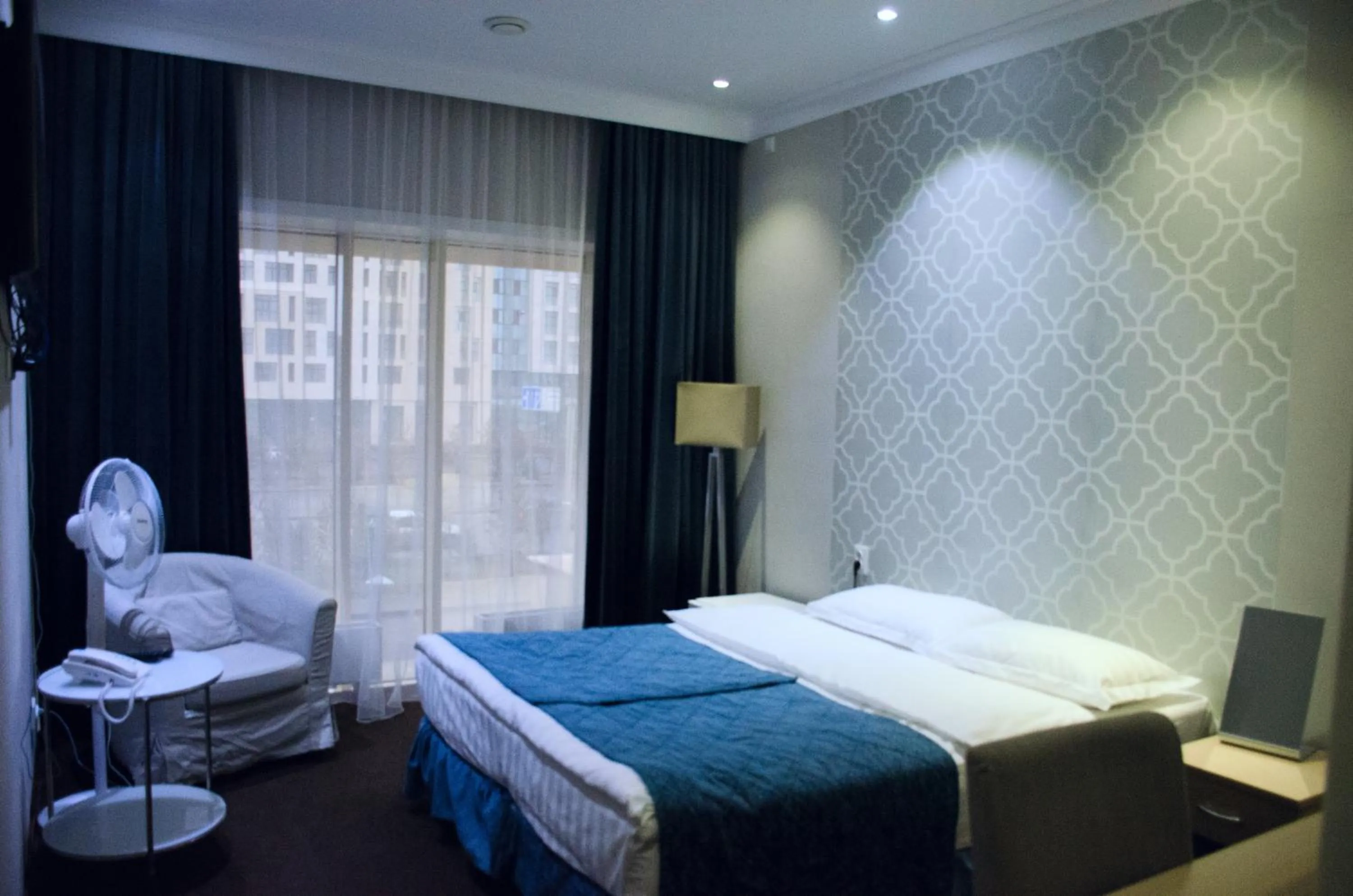 Bed in Orynbor Boutique Hotel