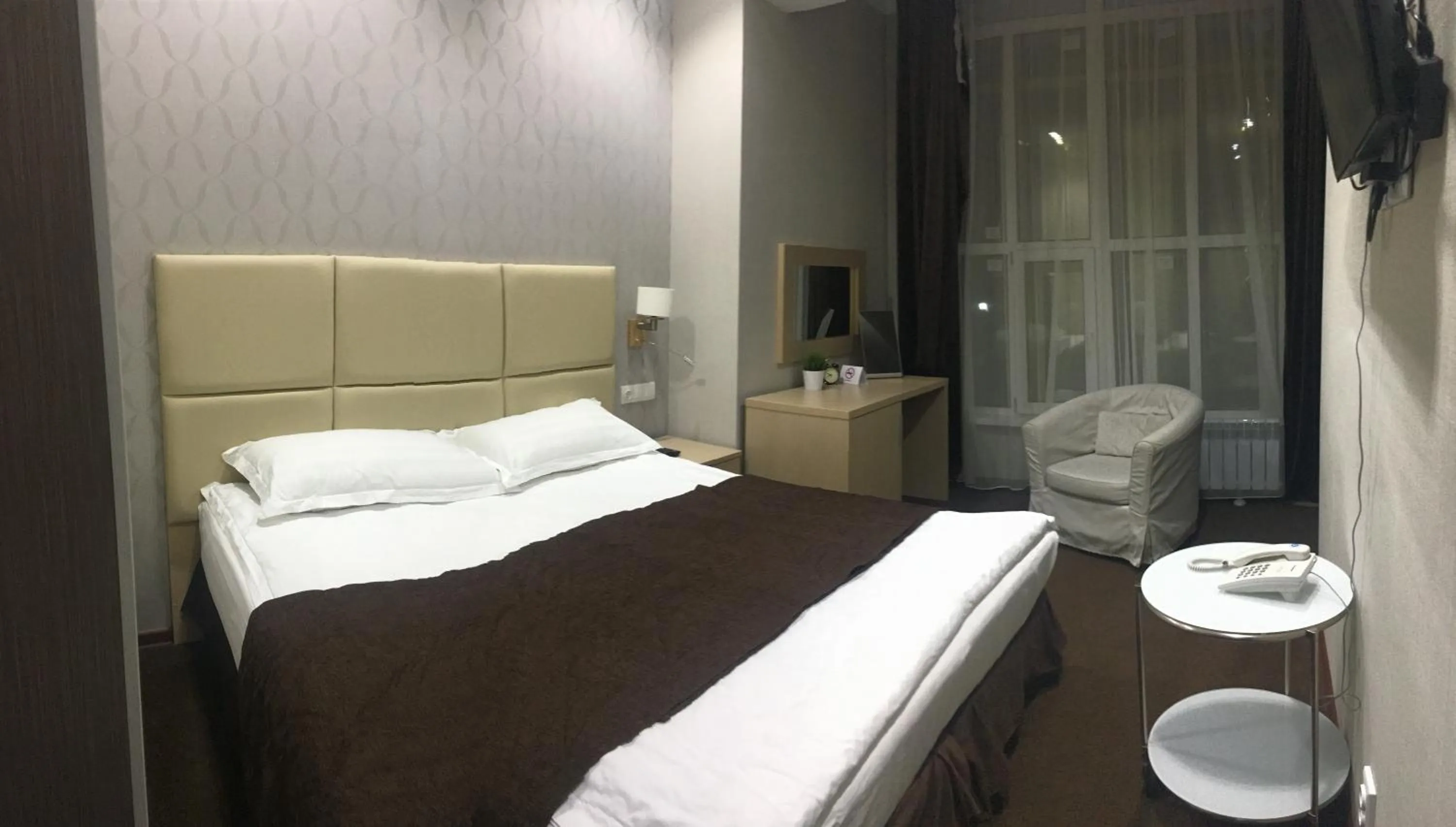 Bed in Orynbor Boutique Hotel